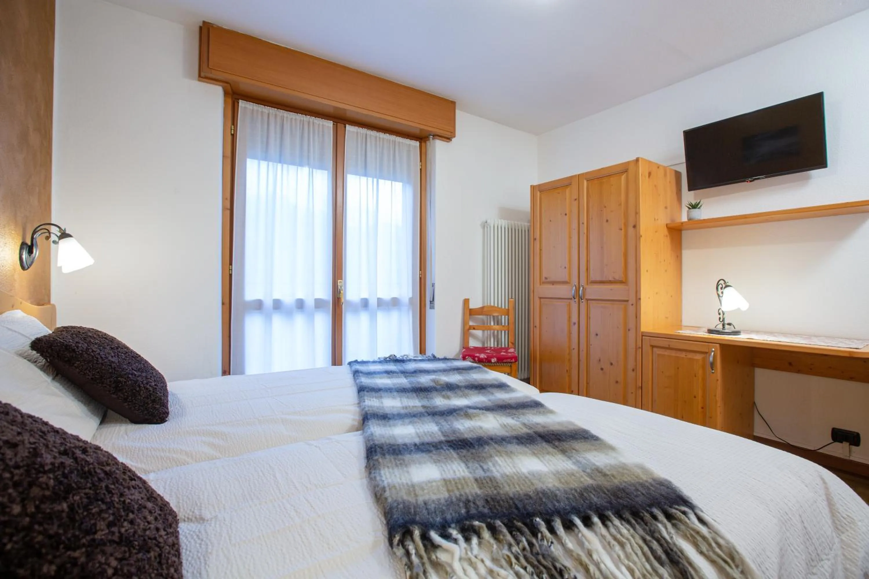 Bed in Hotel Biancospino