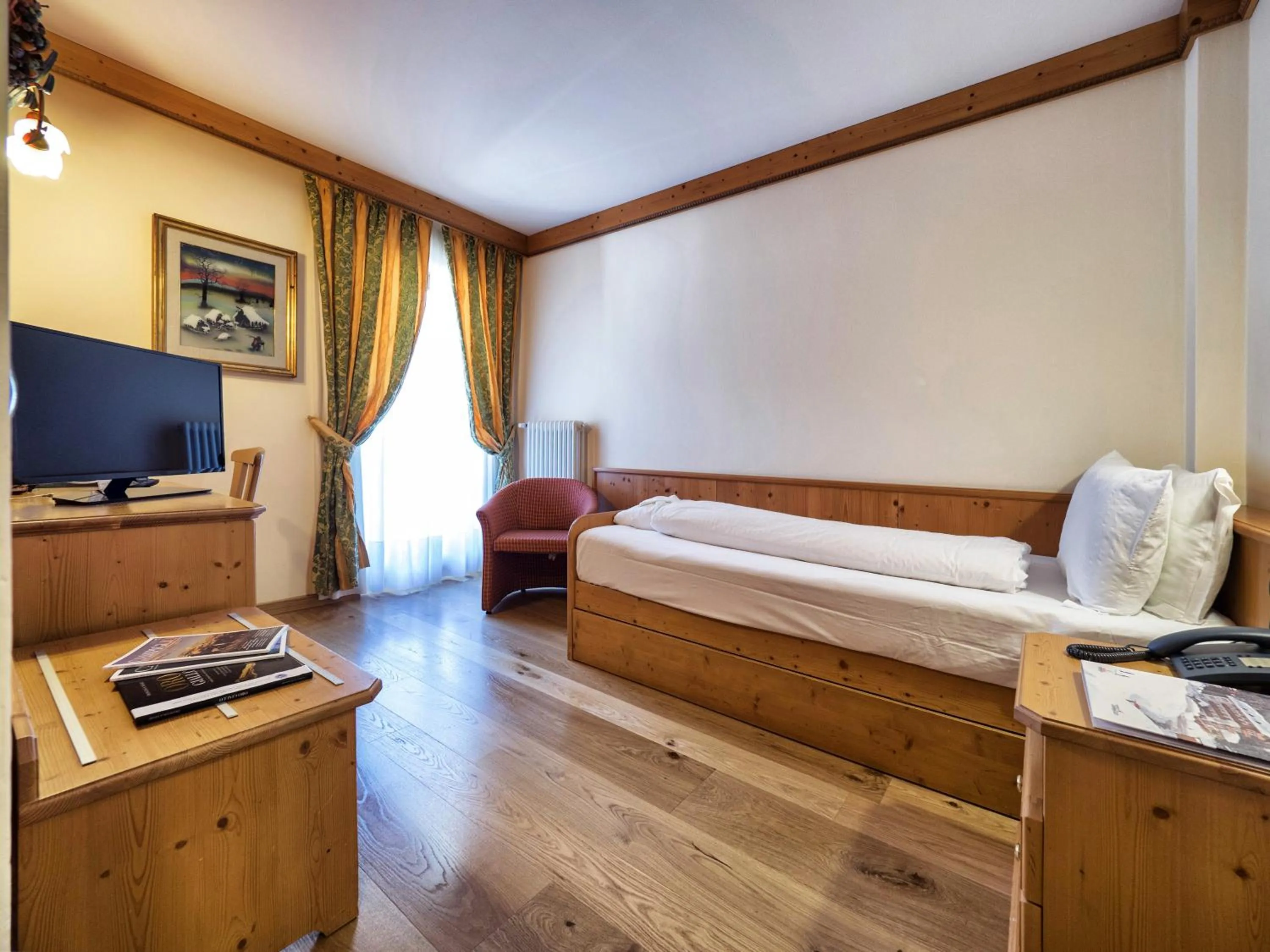 Bed in Hotel Bertelli