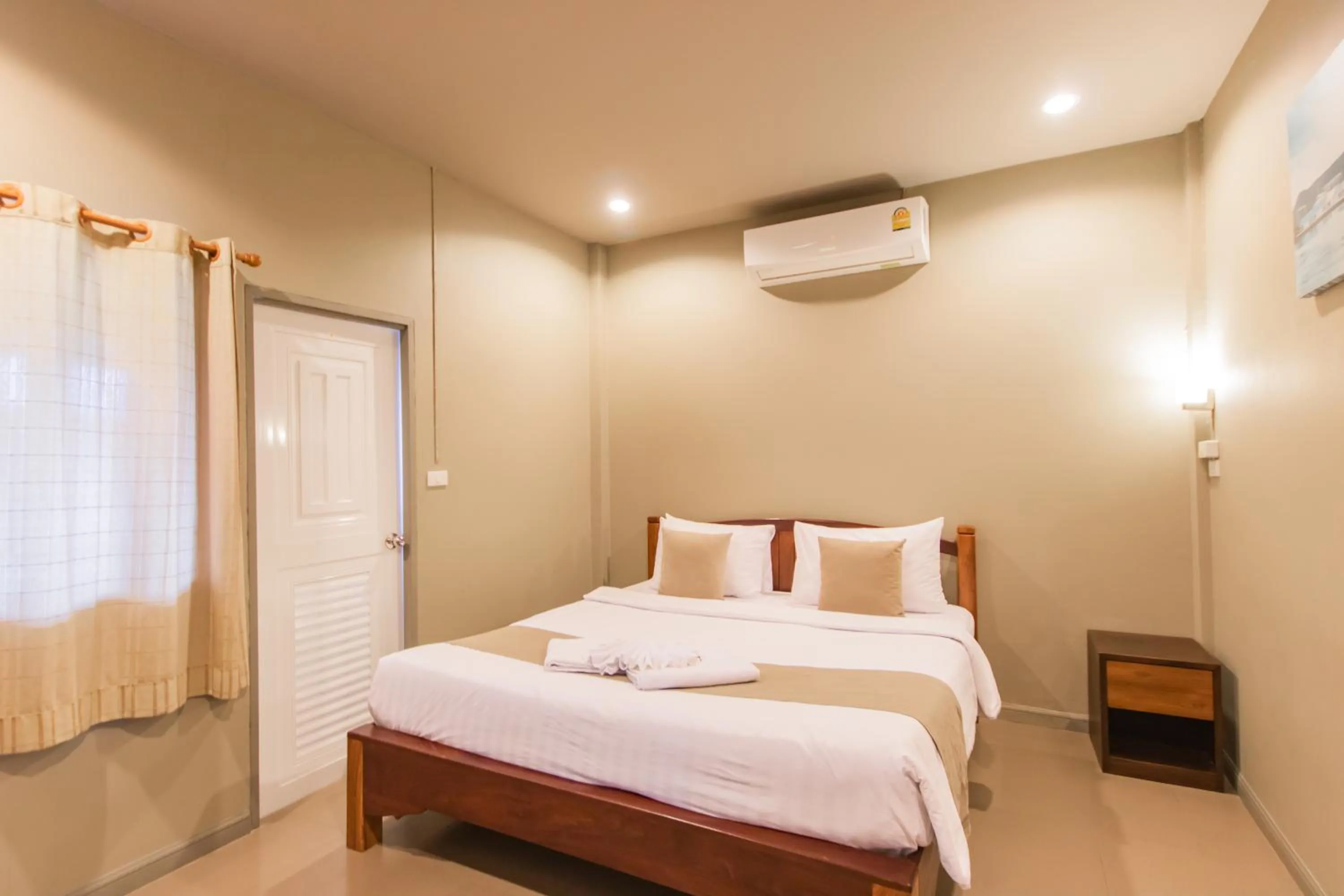 Bed in Baan Tah On The Sea