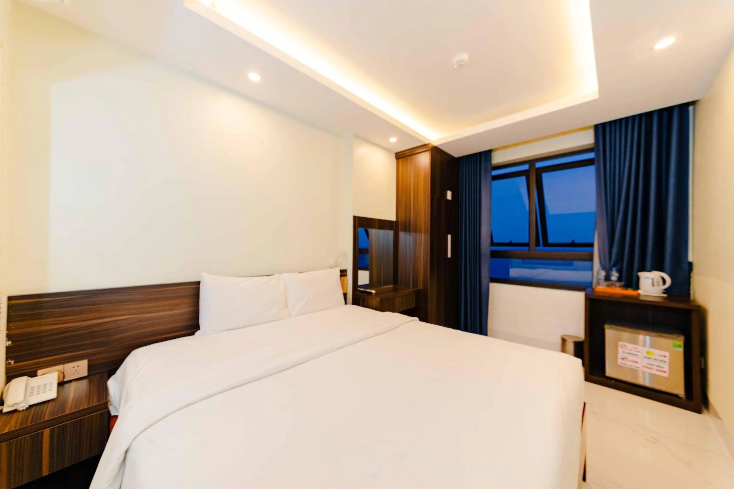 Photo of the whole room, Bed in Sin OAE