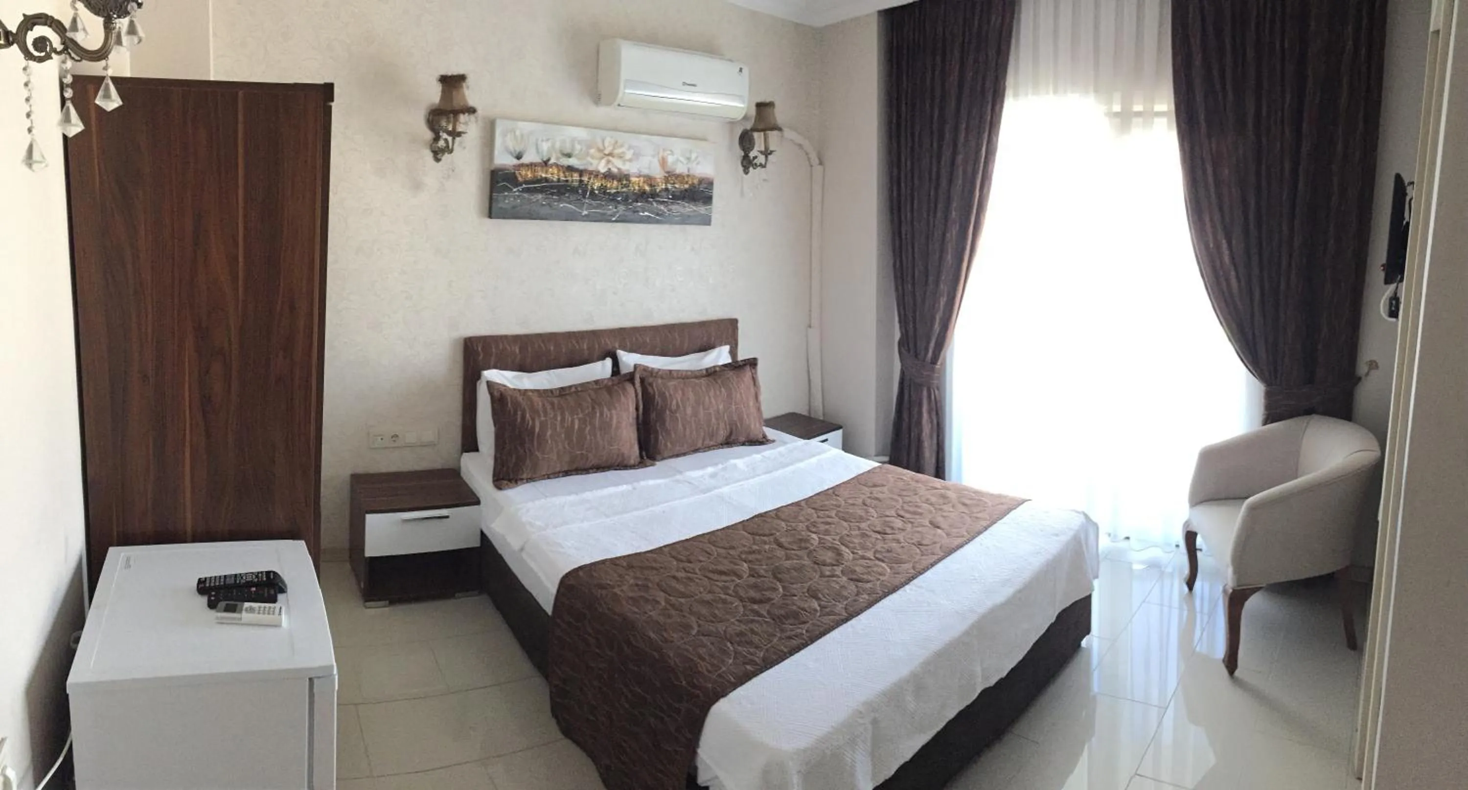 Bed in Geyi̇kli̇ Sunshi̇ne Hotel