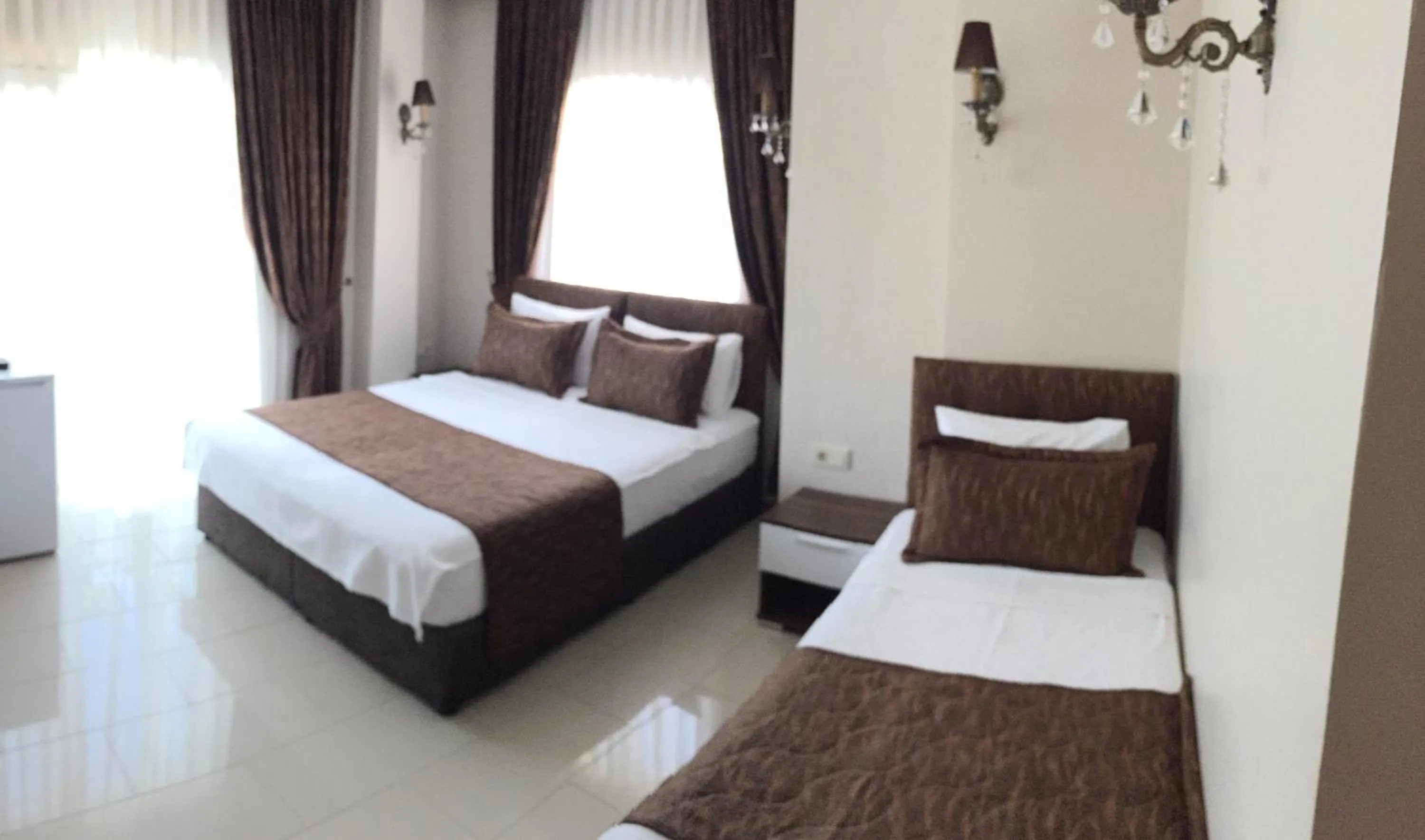 Bed in Geyi̇kli̇ Sunshi̇ne Hotel