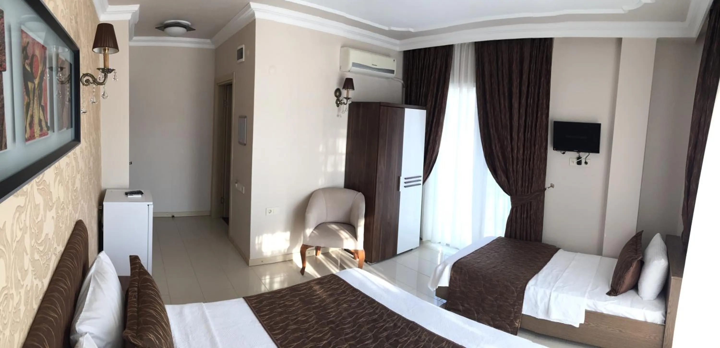Bed in Geyi̇kli̇ Sunshi̇ne Hotel