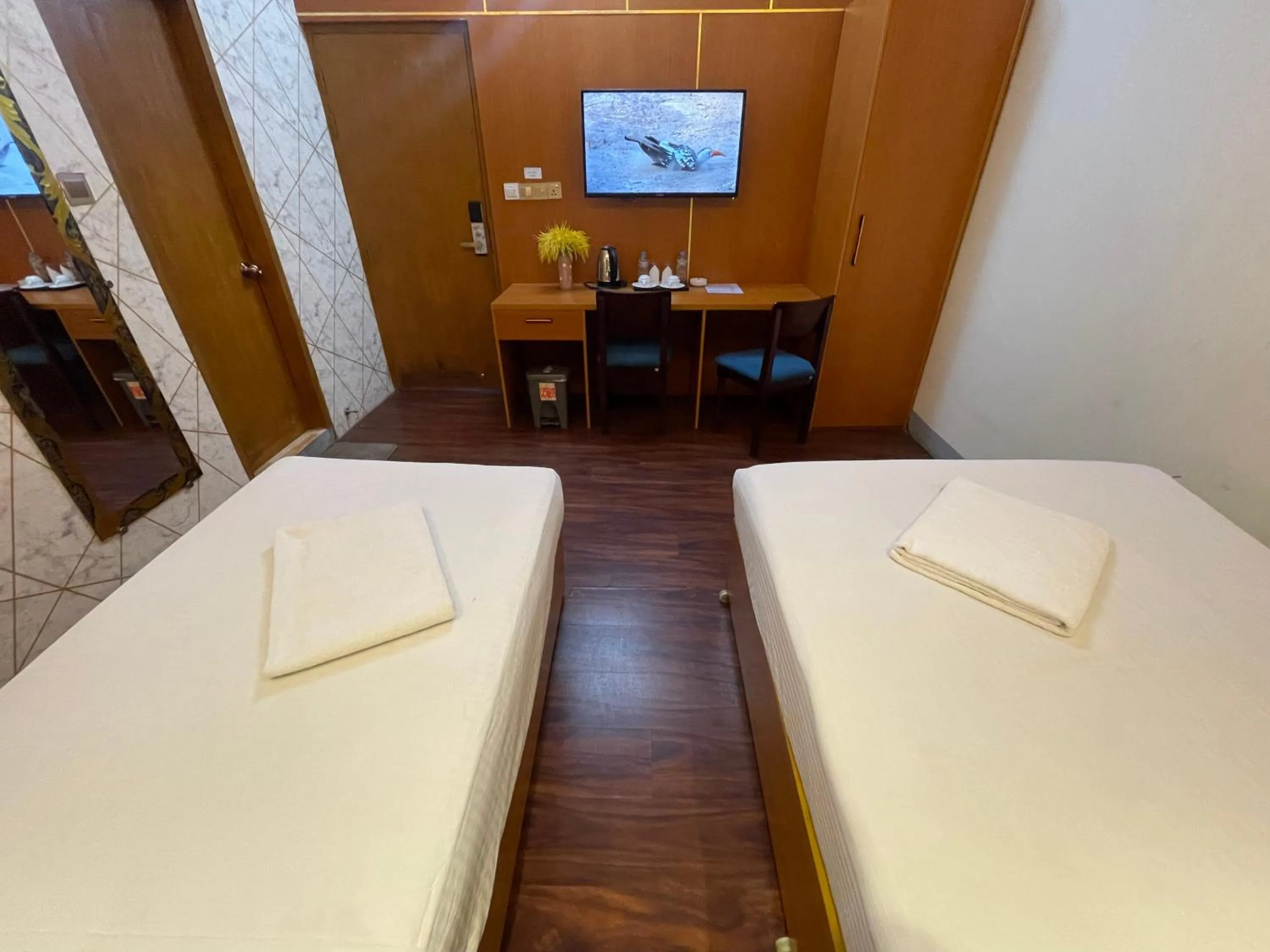 Bed in Hotel Rosewood Uttara