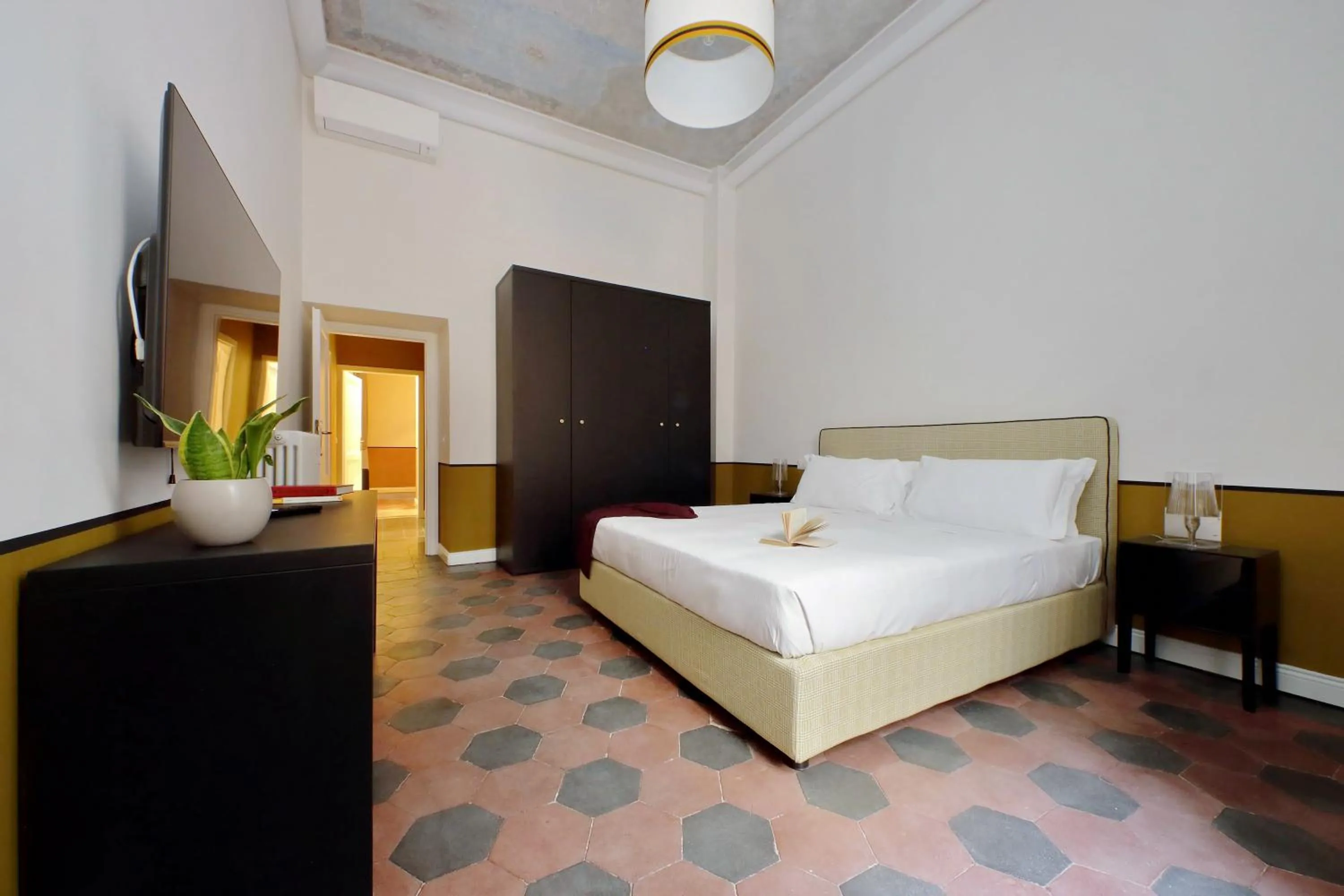 Bed in Monti Apartments - My Extra Home