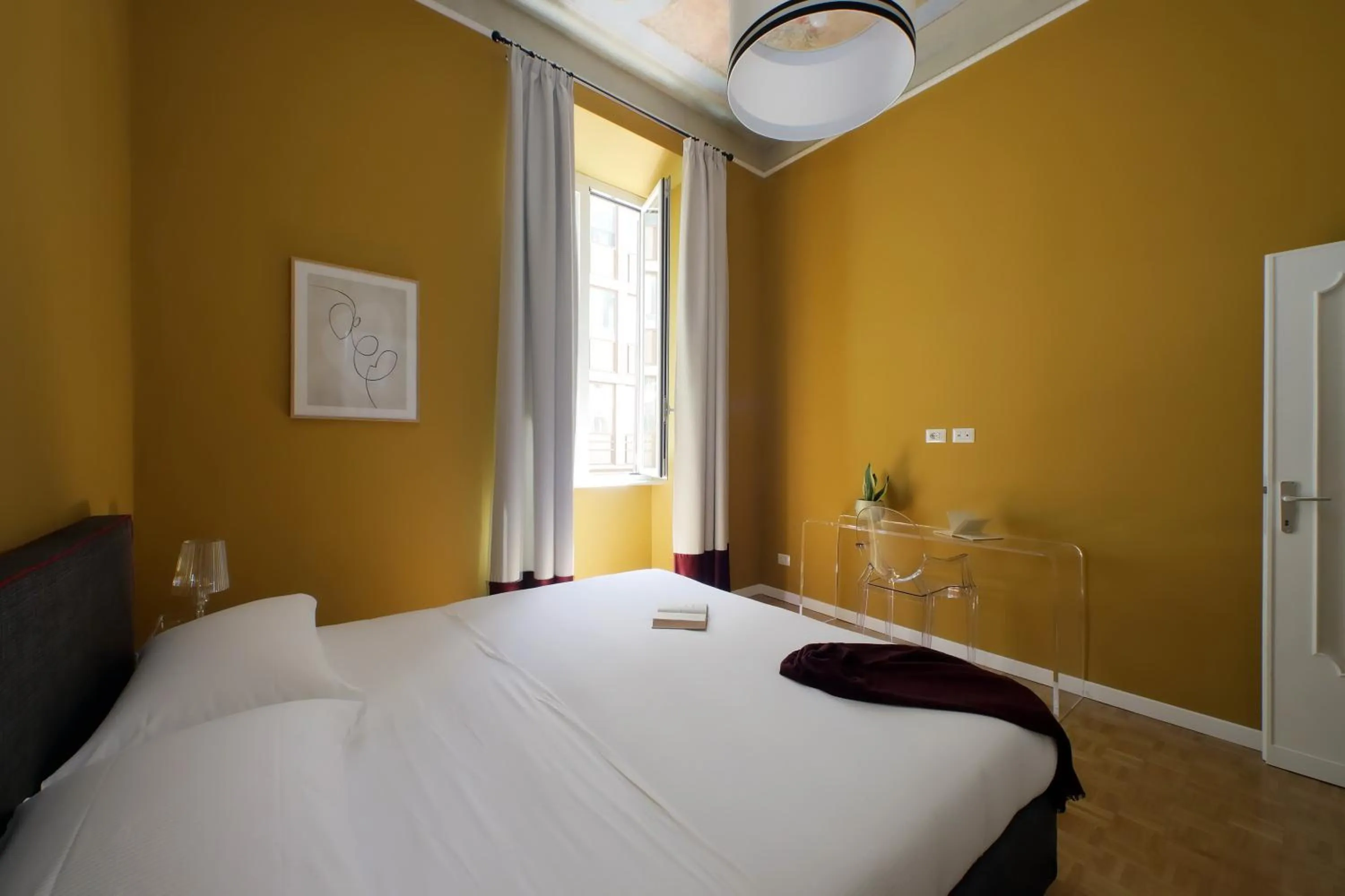 Bed in Monti Apartments - My Extra Home