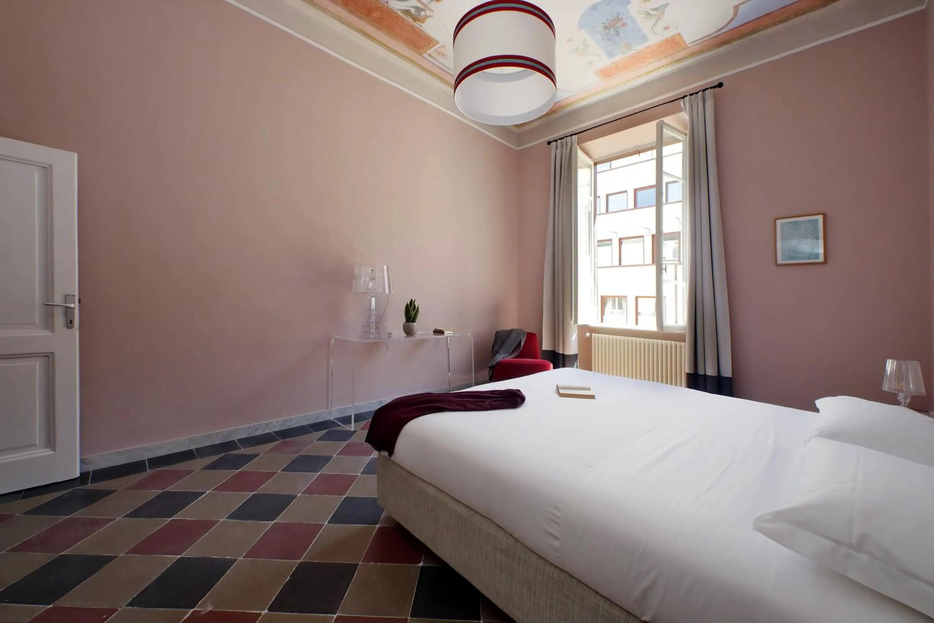 Bed in Monti Apartments - My Extra Home