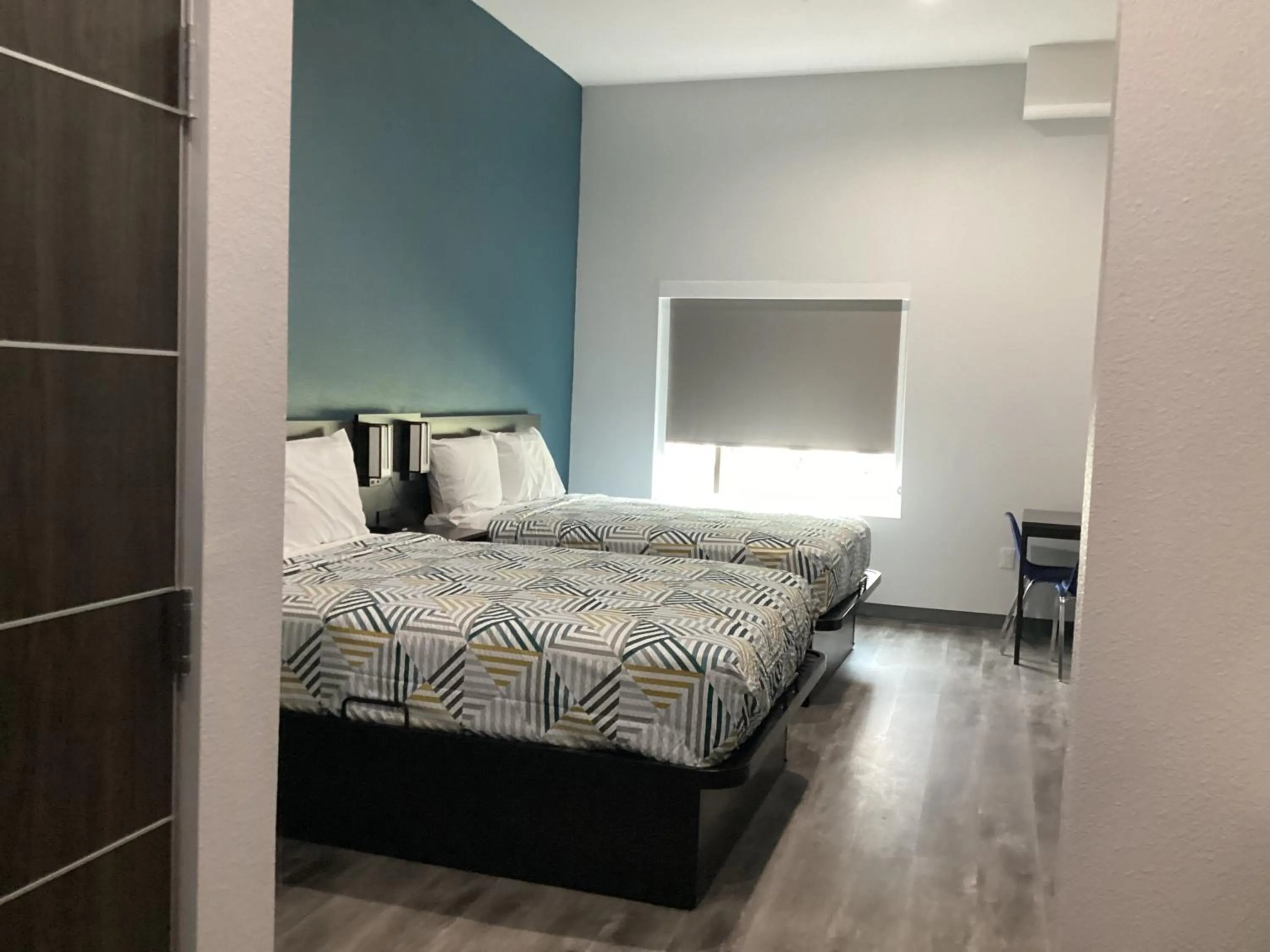 Bed in Studio 6 Dallas, TX – Fair Park
