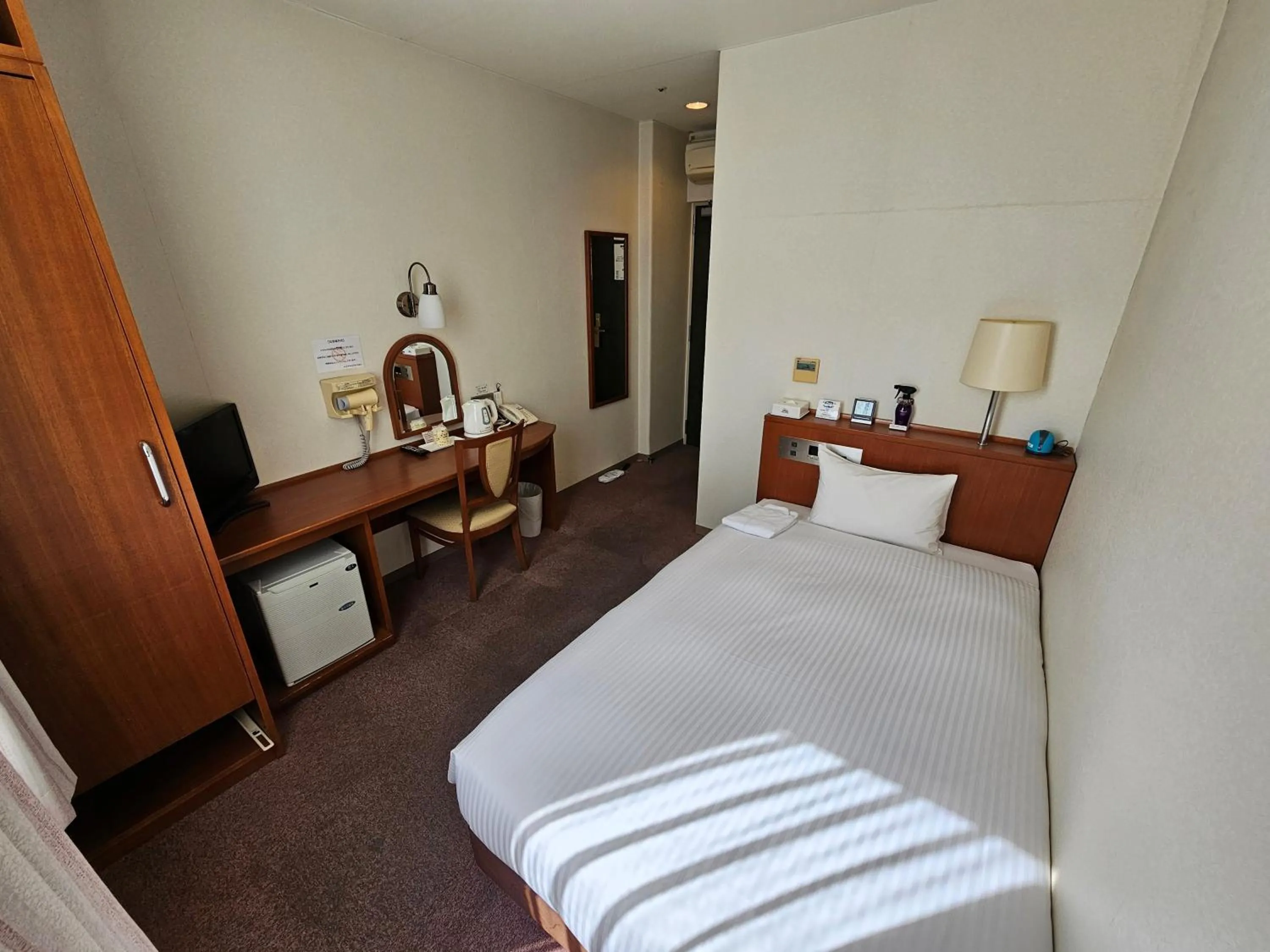 Photo of the whole room, Bed in Royal Hotel Uohachi