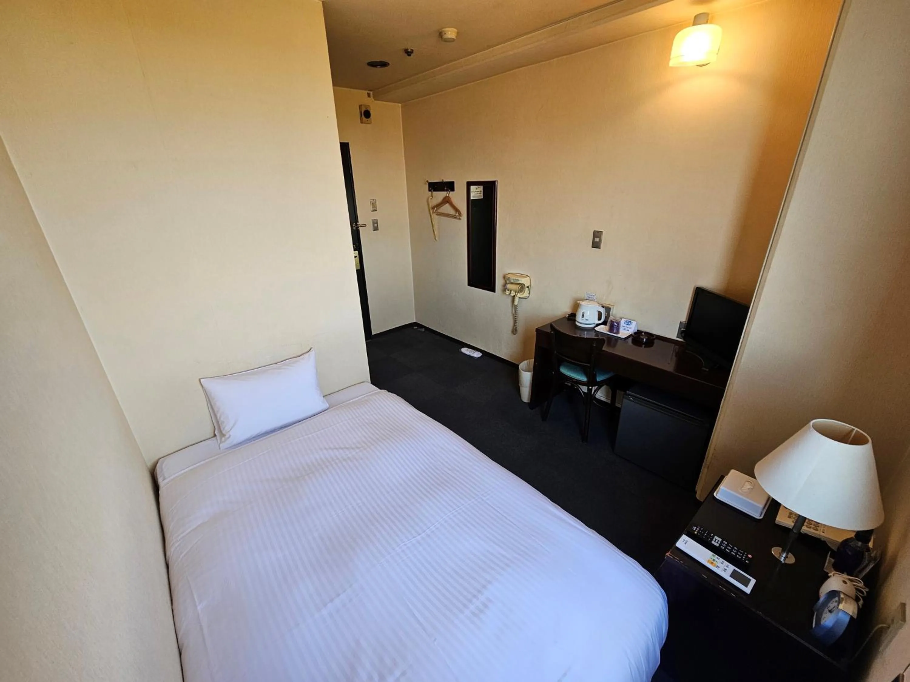 Photo of the whole room, Bed in Royal Hotel Uohachi
