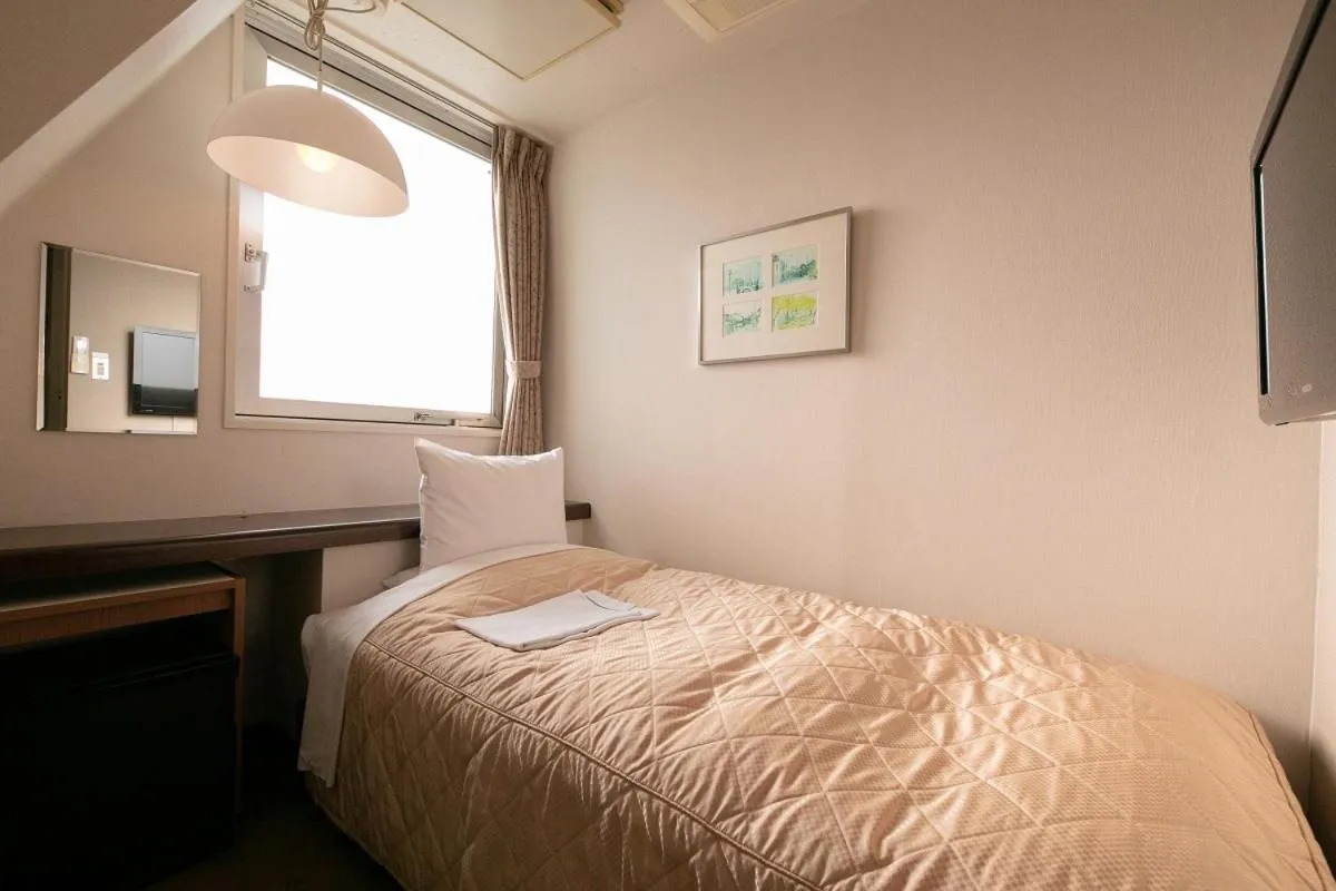 Bed in Morioka City Hotel