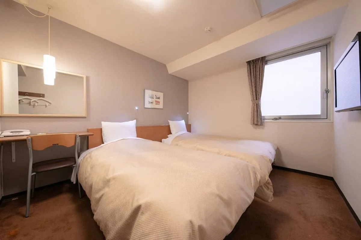 Bed in Morioka City Hotel