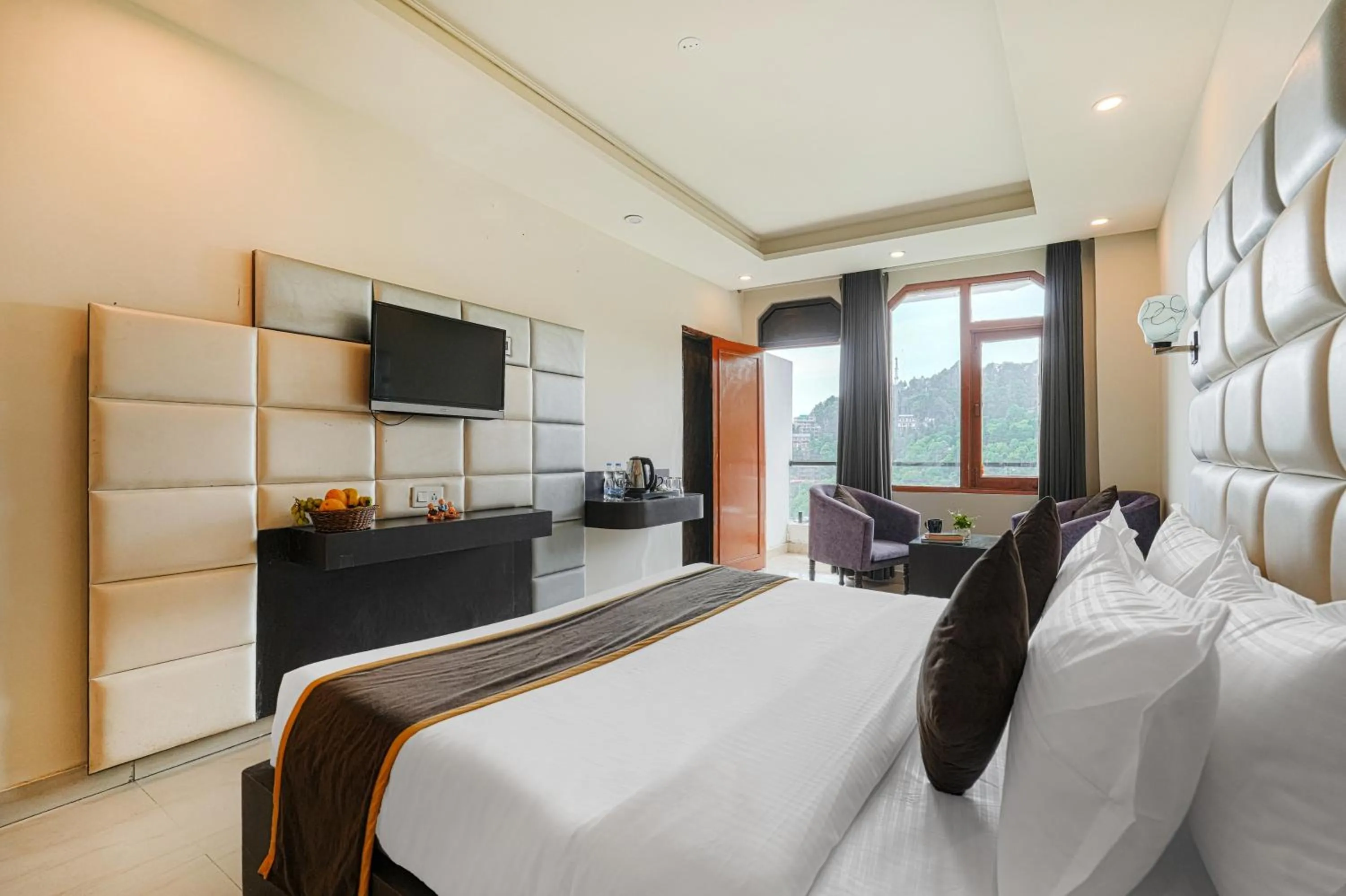 Bedroom, Bed in Pax Hotel Spring Solance 200 mtr from Gandhi Chowk Khajjiyar Road