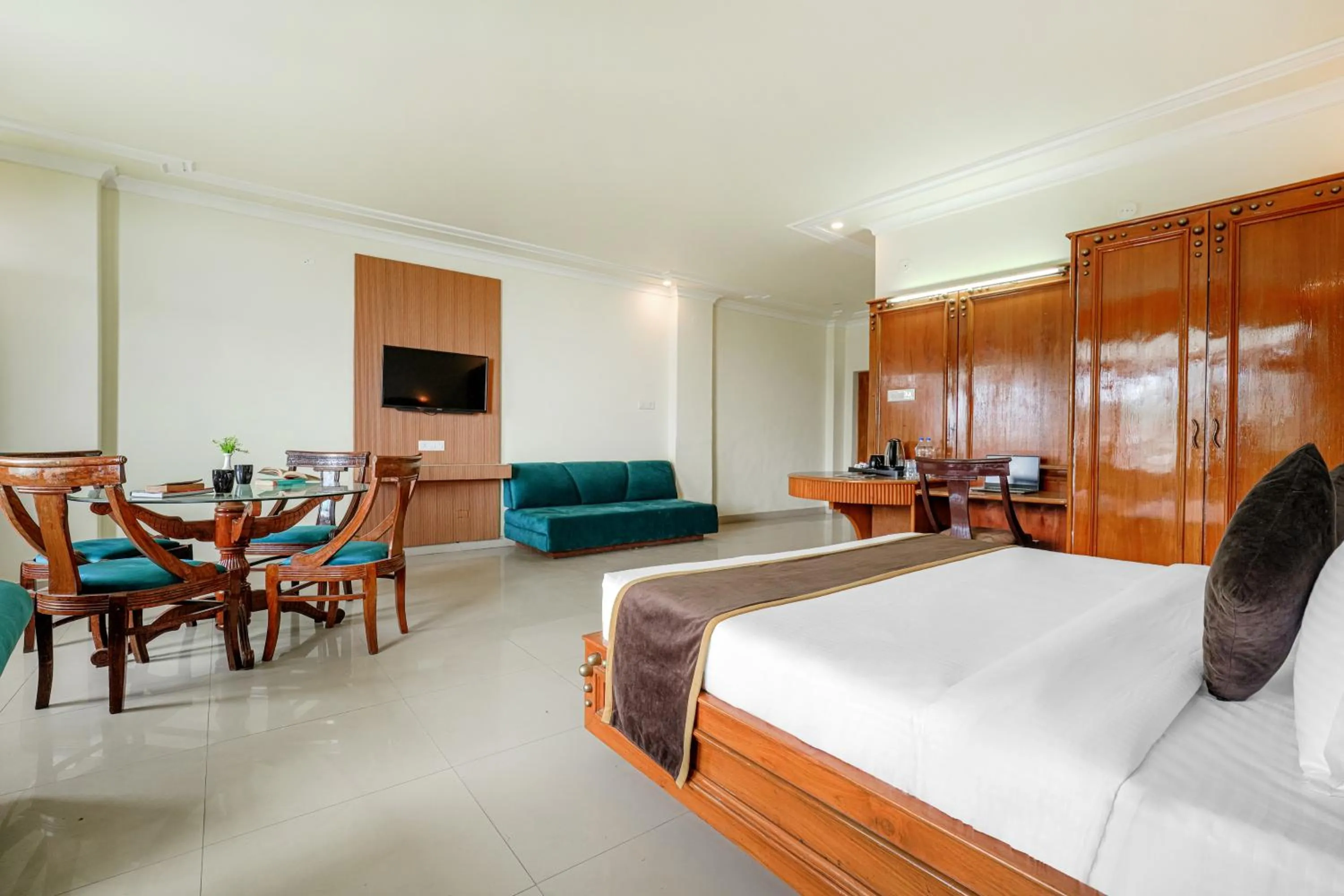 Photo of the whole room, Bed in Pax Hotel Spring Solance 200 mtr from Gandhi Chowk Khajjiyar Road