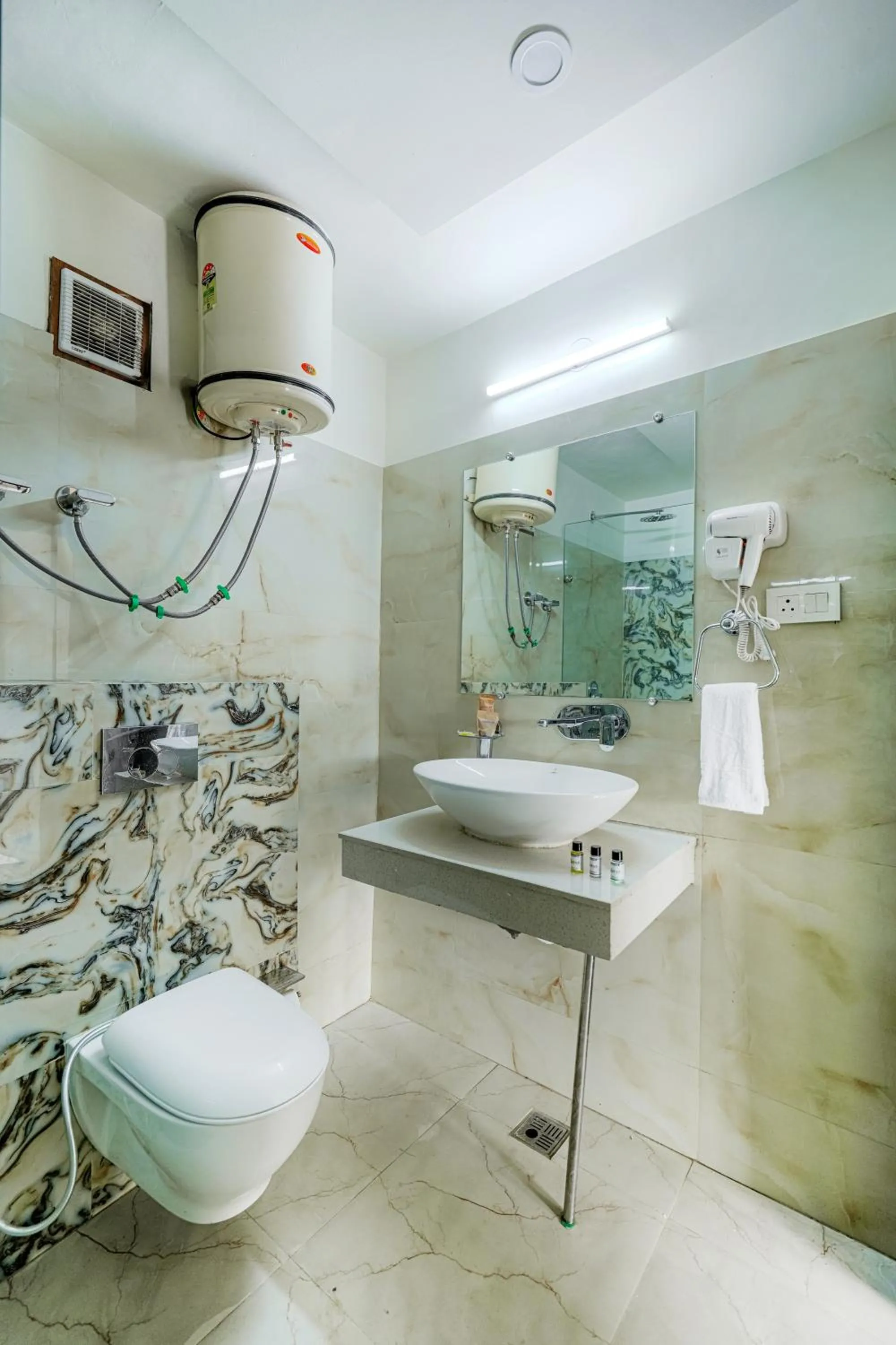 Bathroom in Pax Hotel Spring Solance 200 mtr from Gandhi Chowk Khajjiyar Road