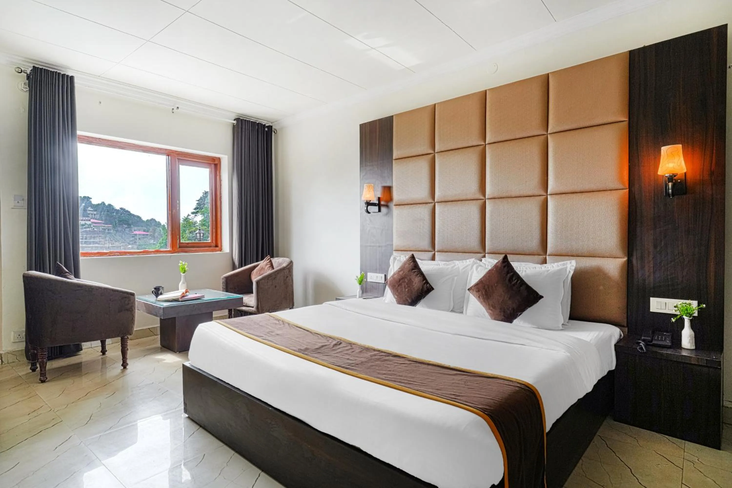 Photo of the whole room, Bed in Pax Hotel Spring Solance 200 mtr from Gandhi Chowk Khajjiyar Road