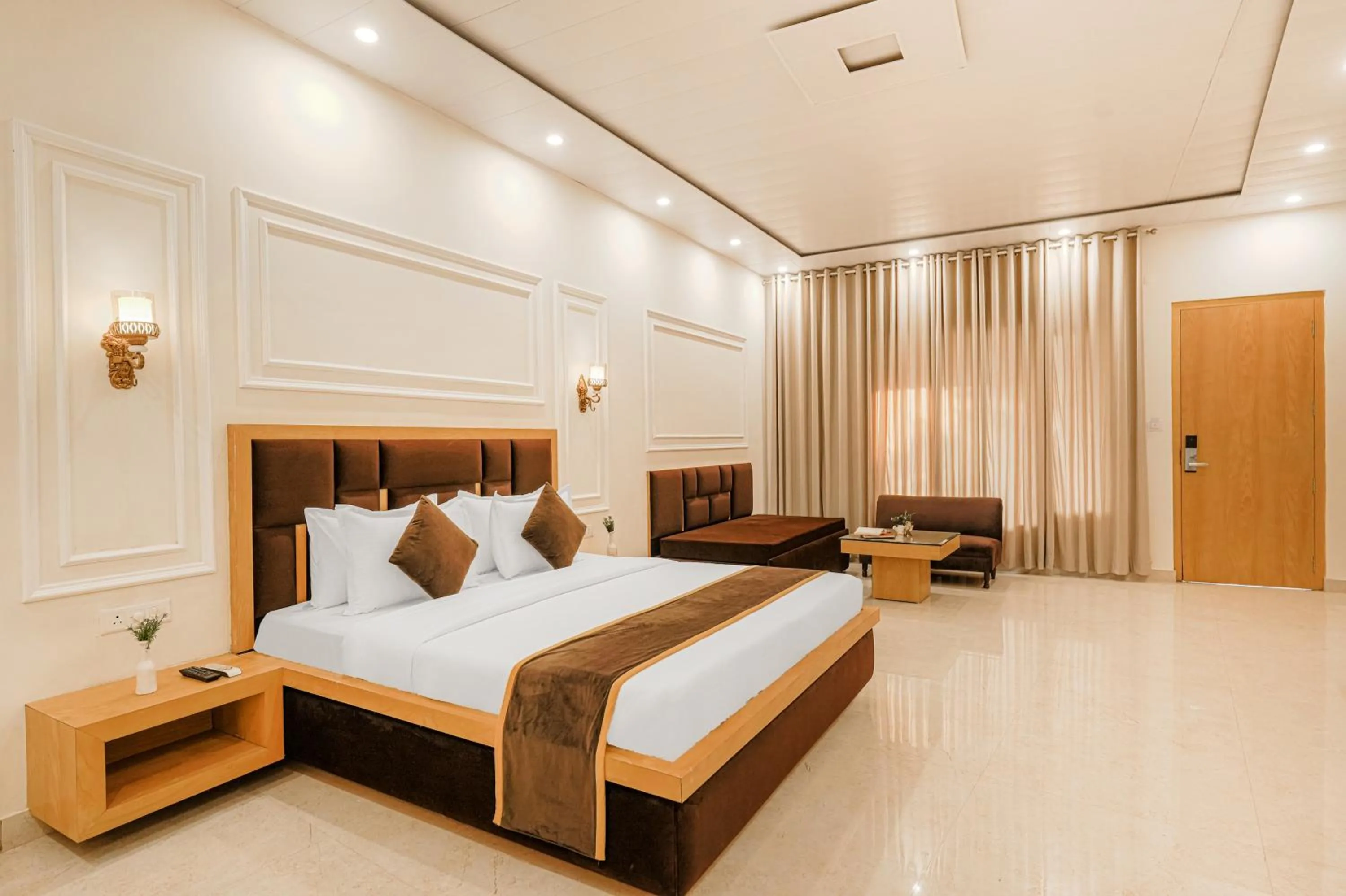 Photo of the whole room, Bed in Pax Hotel Spring Solance 200 mtr from Gandhi Chowk Khajjiyar Road