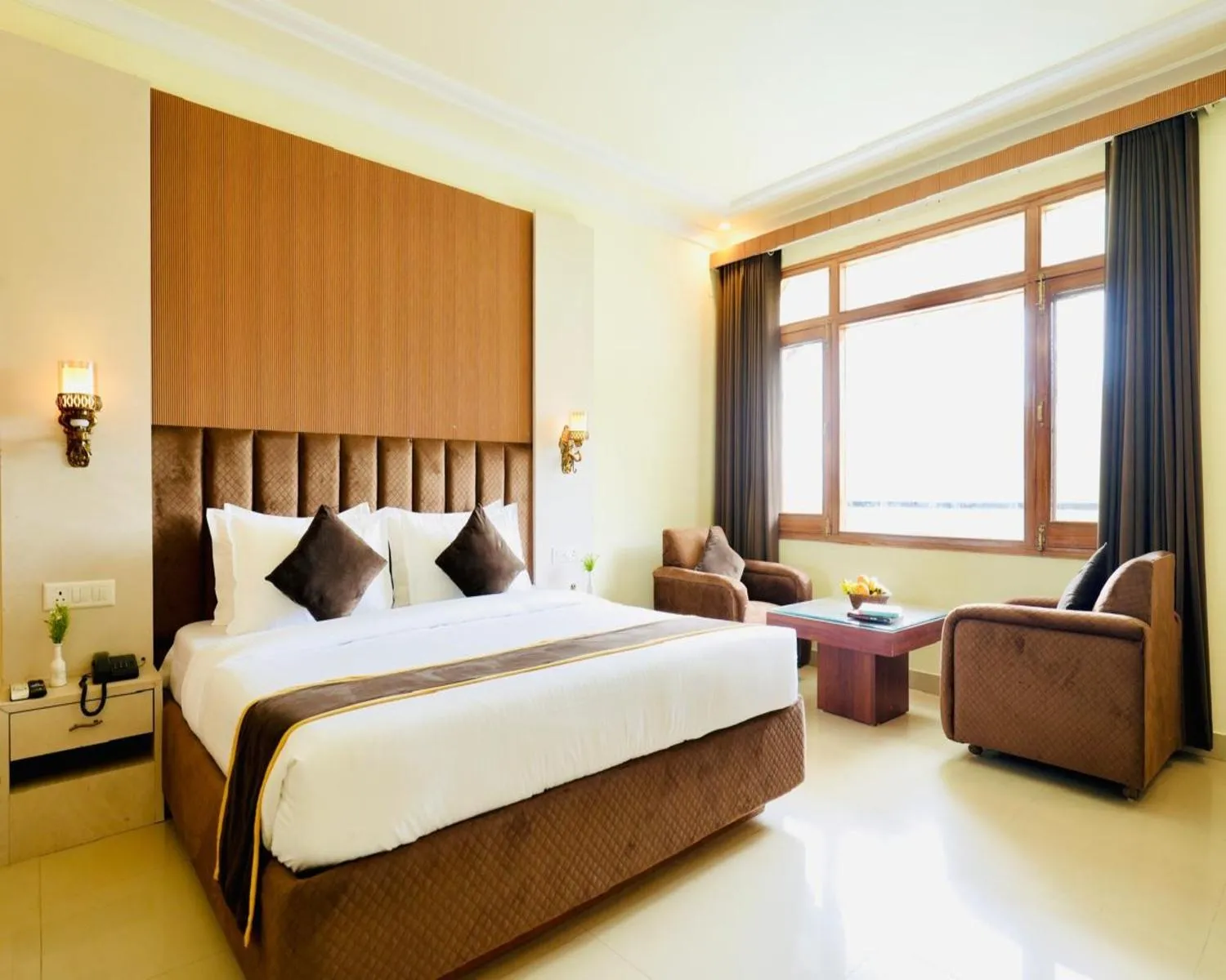 Living room, Bed in Pax Hotel Spring Solance 200 mtr from Gandhi Chowk Khajjiyar Road