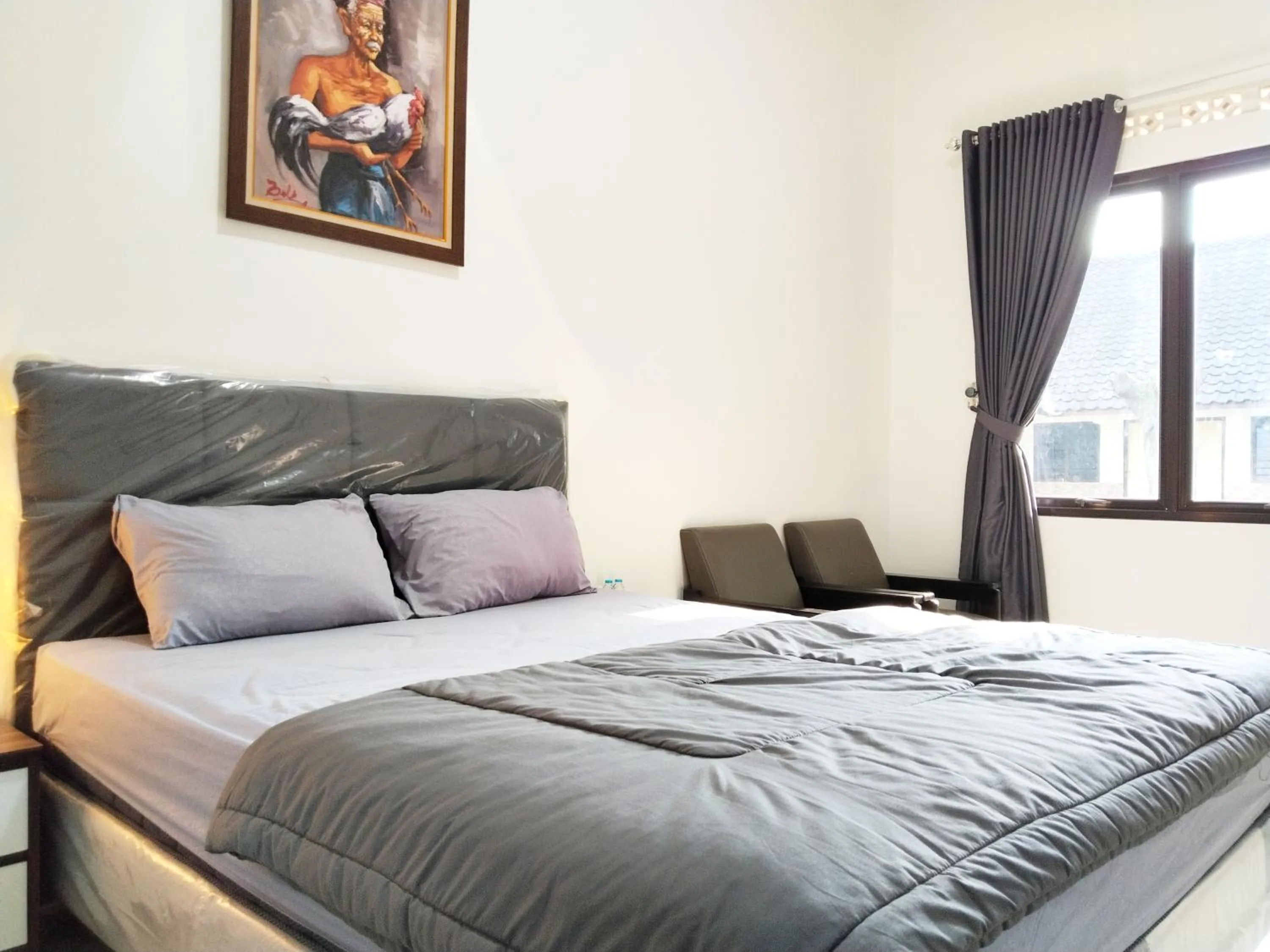 Bed in Roemah Kavaleri powered by Cocotel