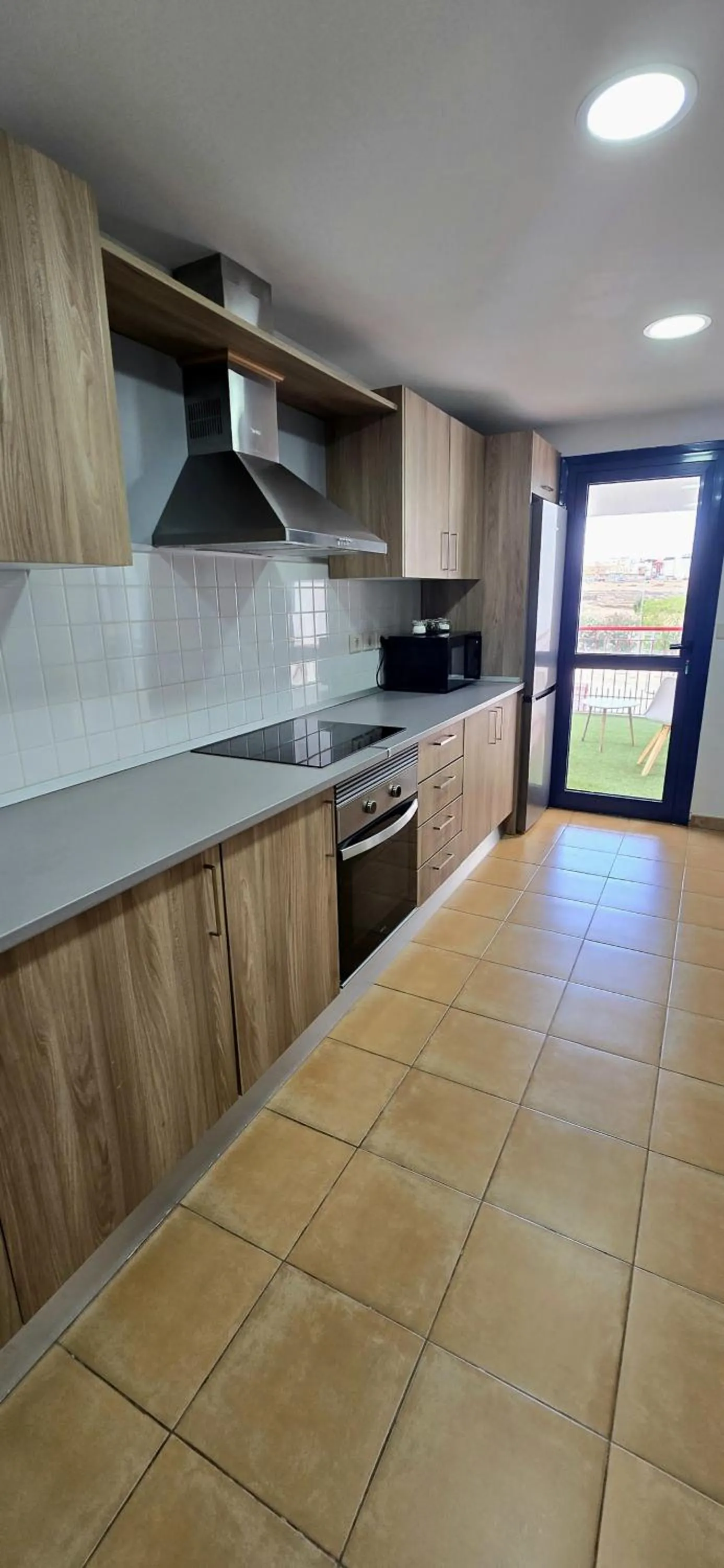 Kitchen or kitchenette in Aregoma Apartamento