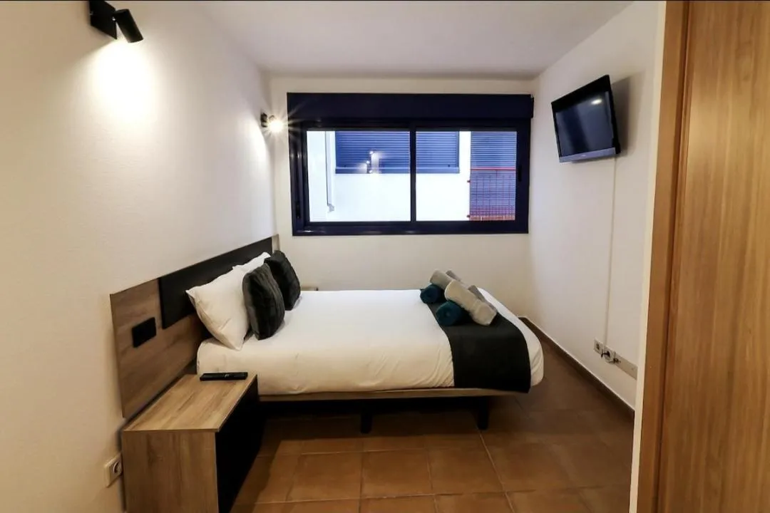 Bed in Aregoma Apartamento