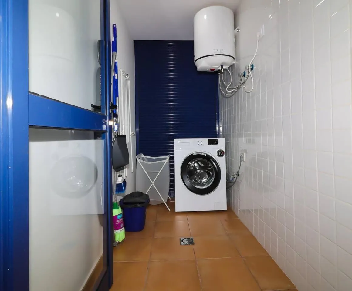 washing machine in Aregoma Apartamento