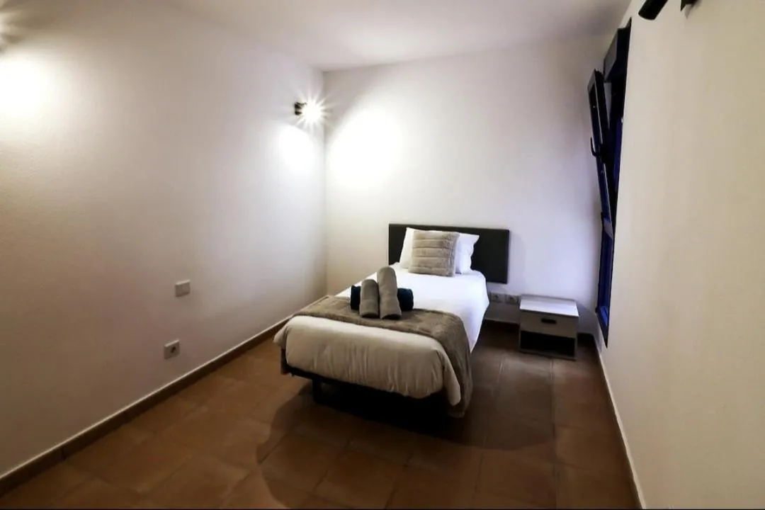 Bed in Aregoma Apartamento