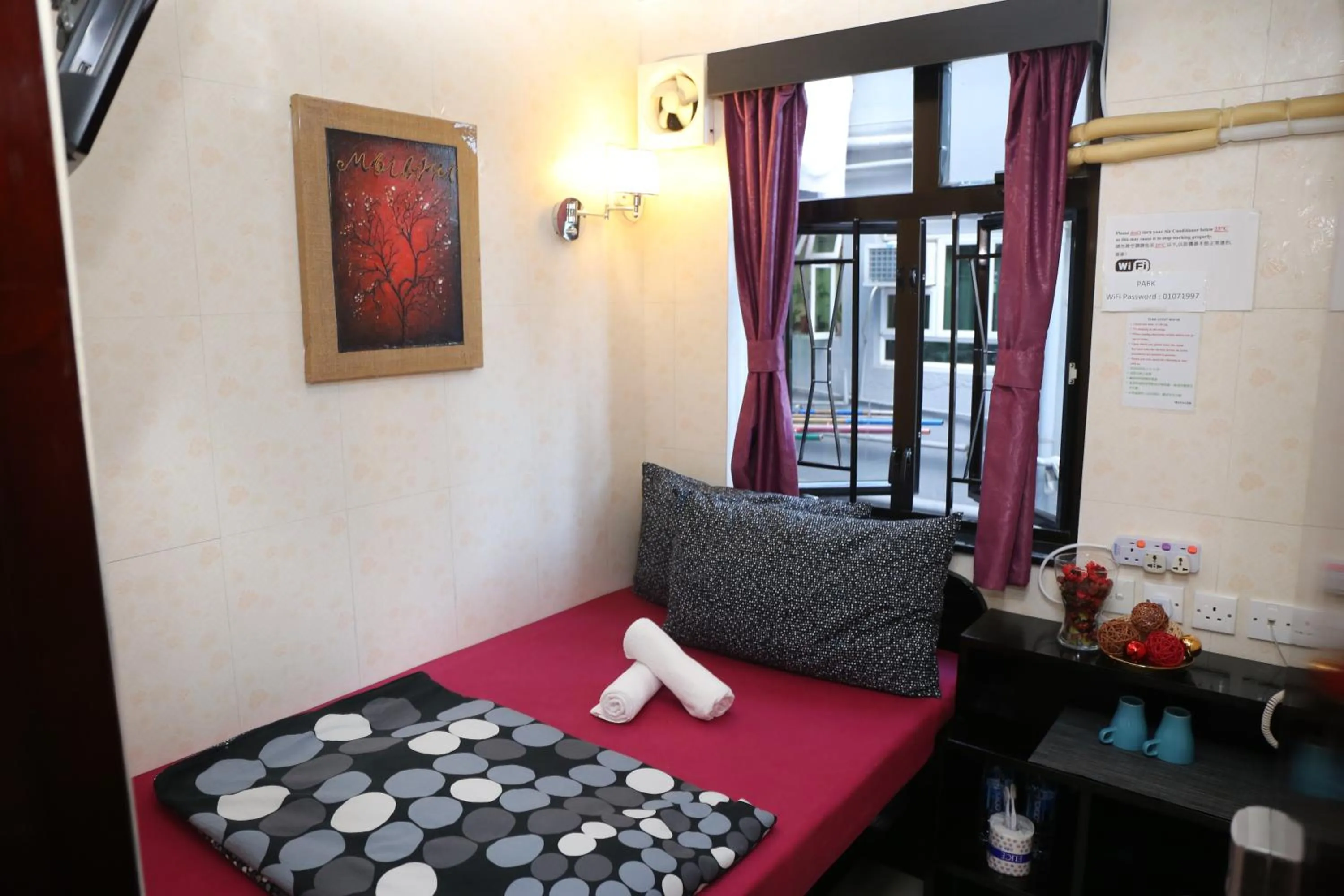 Bedroom, Seating Area in Icon Inn