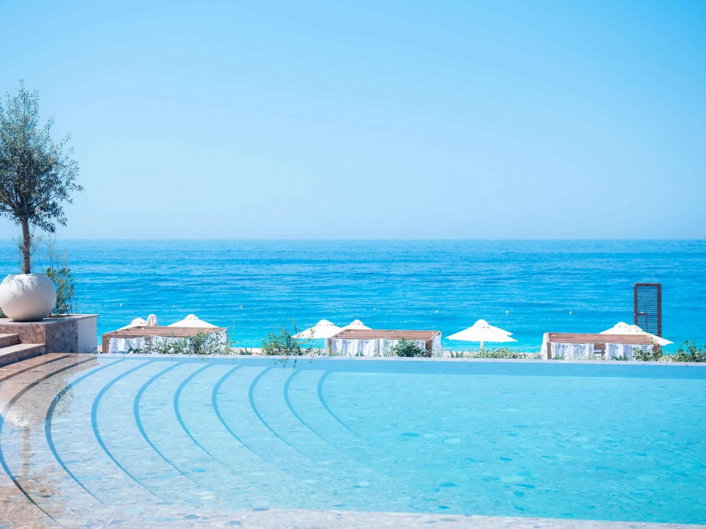 Pool view in Green Coast Hotel MGallery Collection