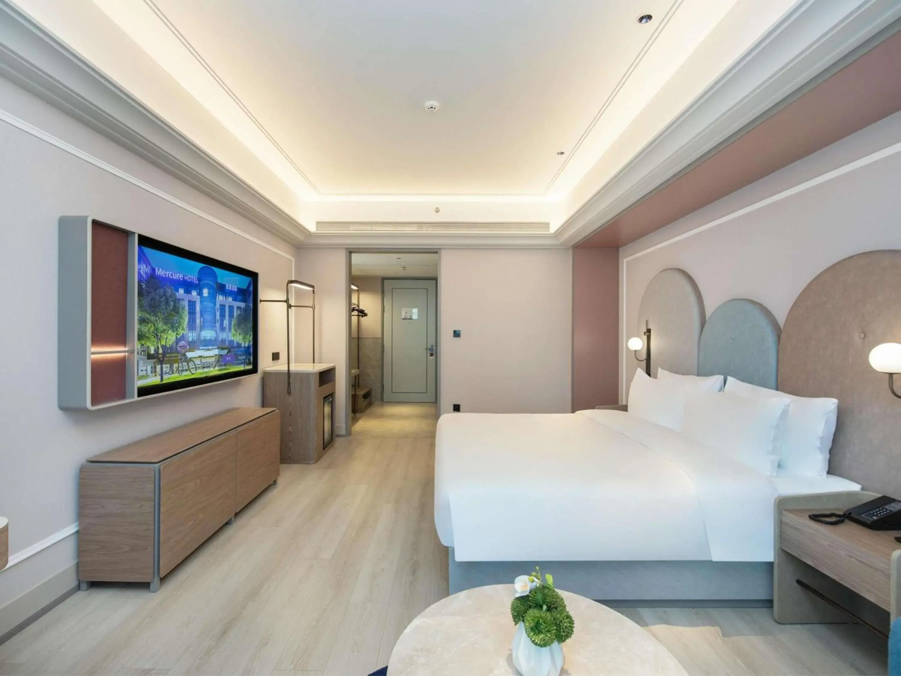 Bedroom in Mercure Haikou City Center Bedroom in Mercure Haikou City Center