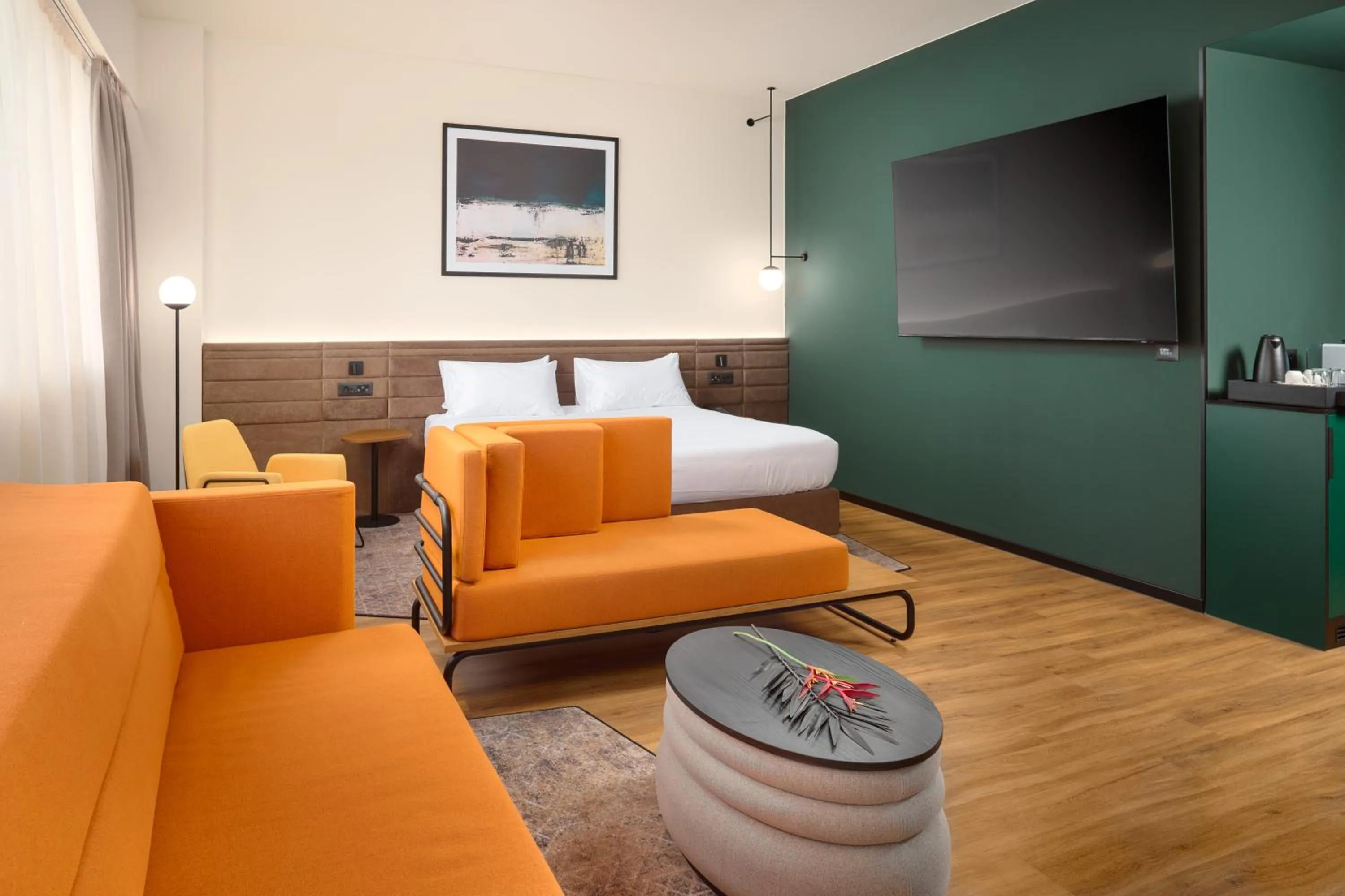 Seating area, Bed in Novotel Zagreb