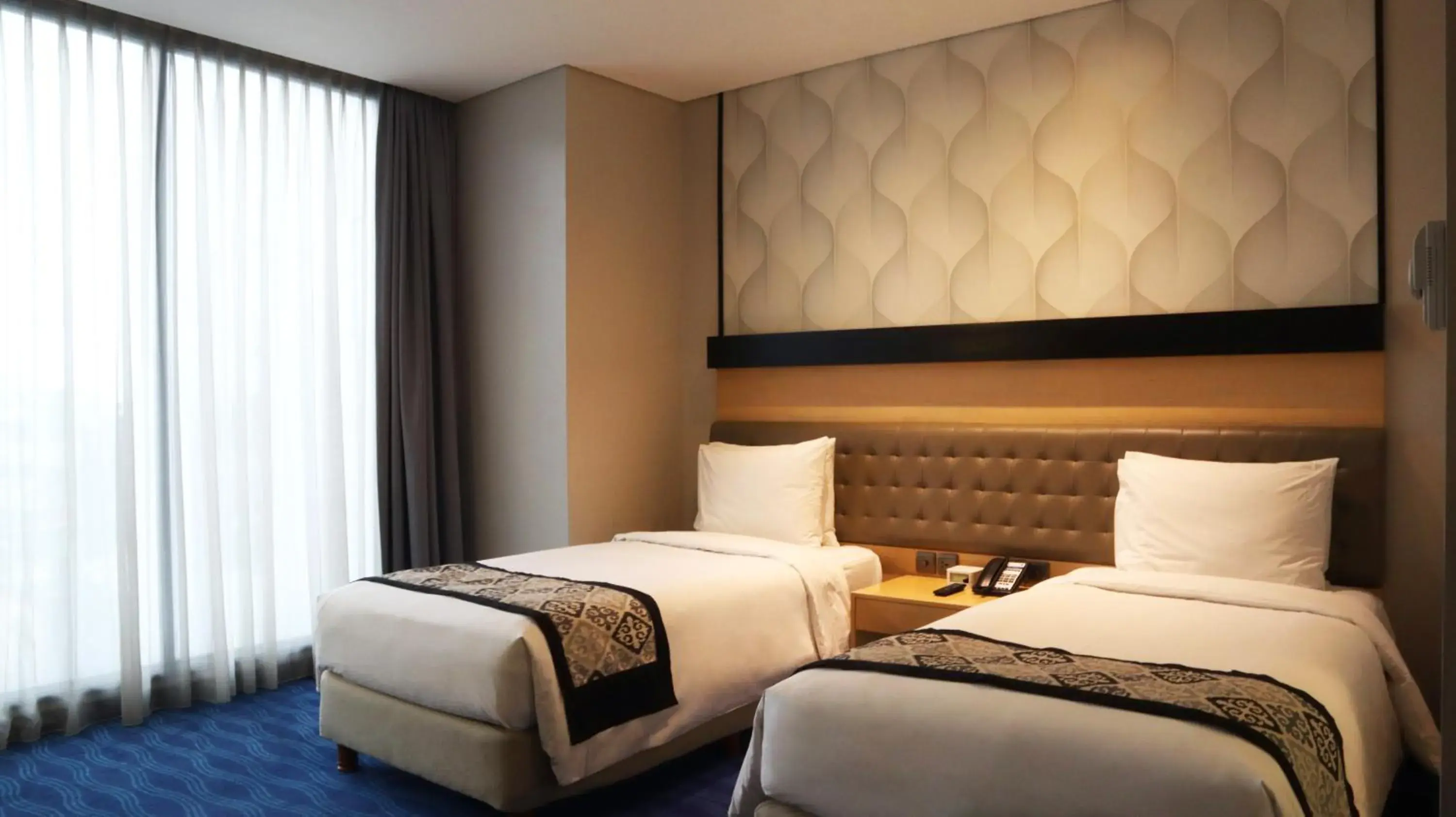 Bed in AI Hotel Jakarta Thamrin