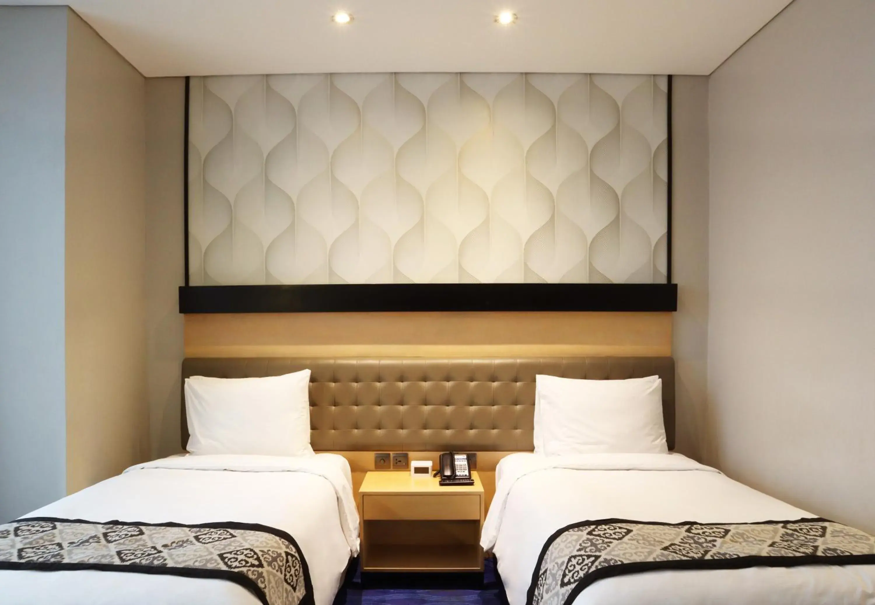 Bed in AI Hotel Jakarta Thamrin