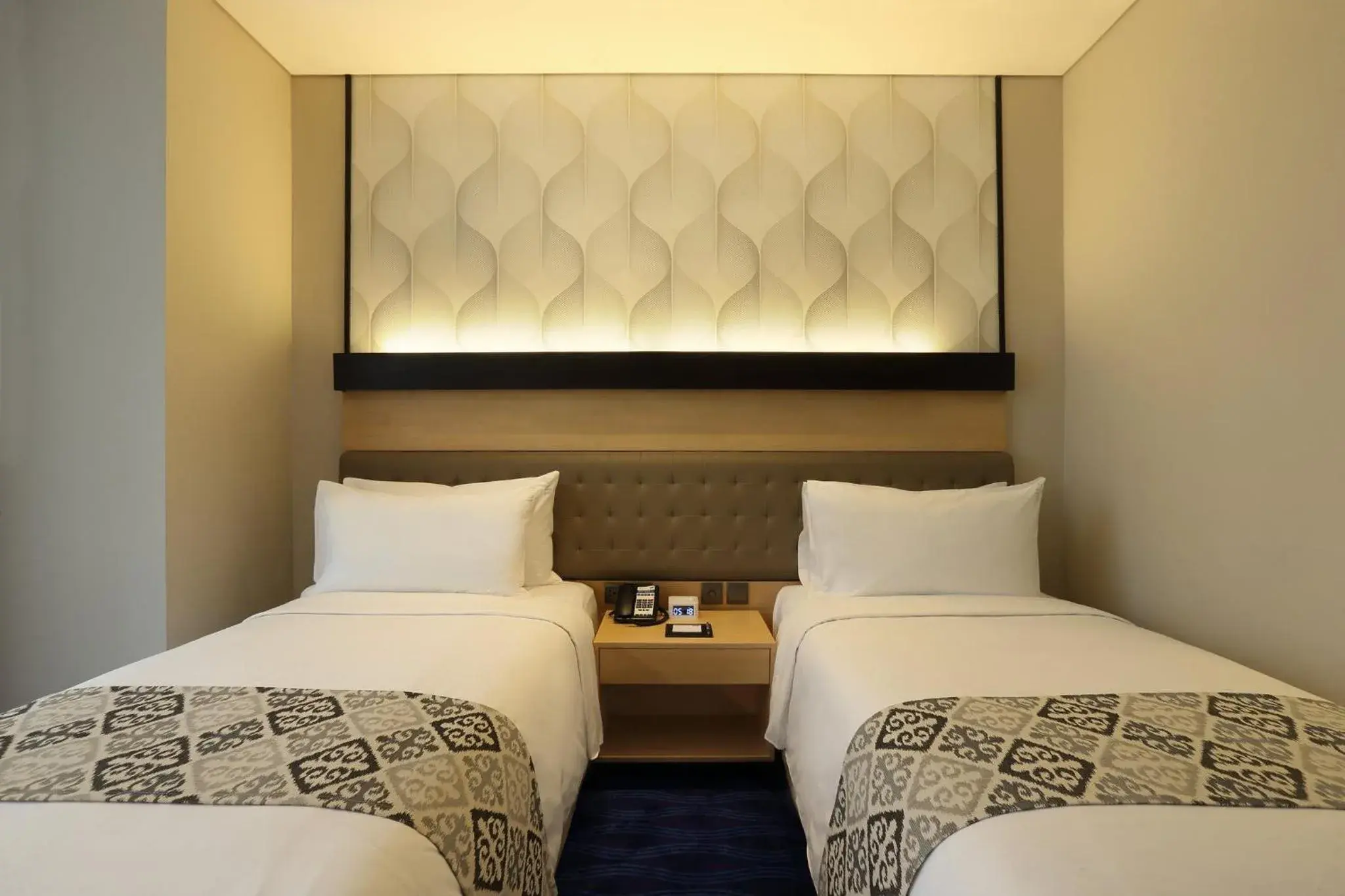 Photo of the whole room, Bed in AI Hotel Jakarta Thamrin