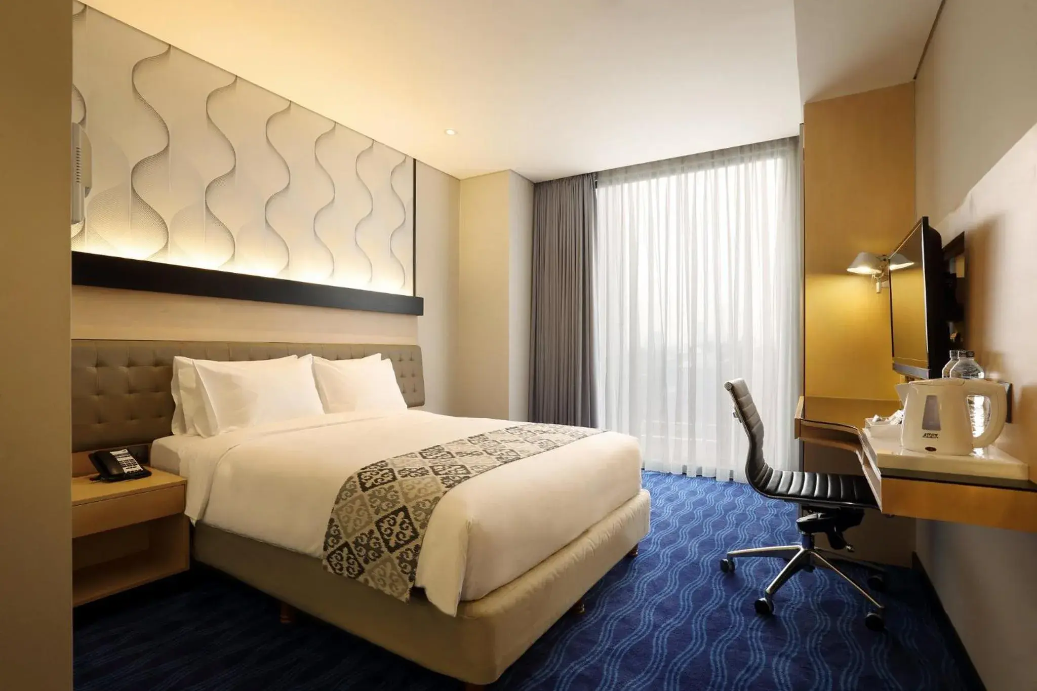 Photo of the whole room, Bed in AI Hotel Jakarta Thamrin