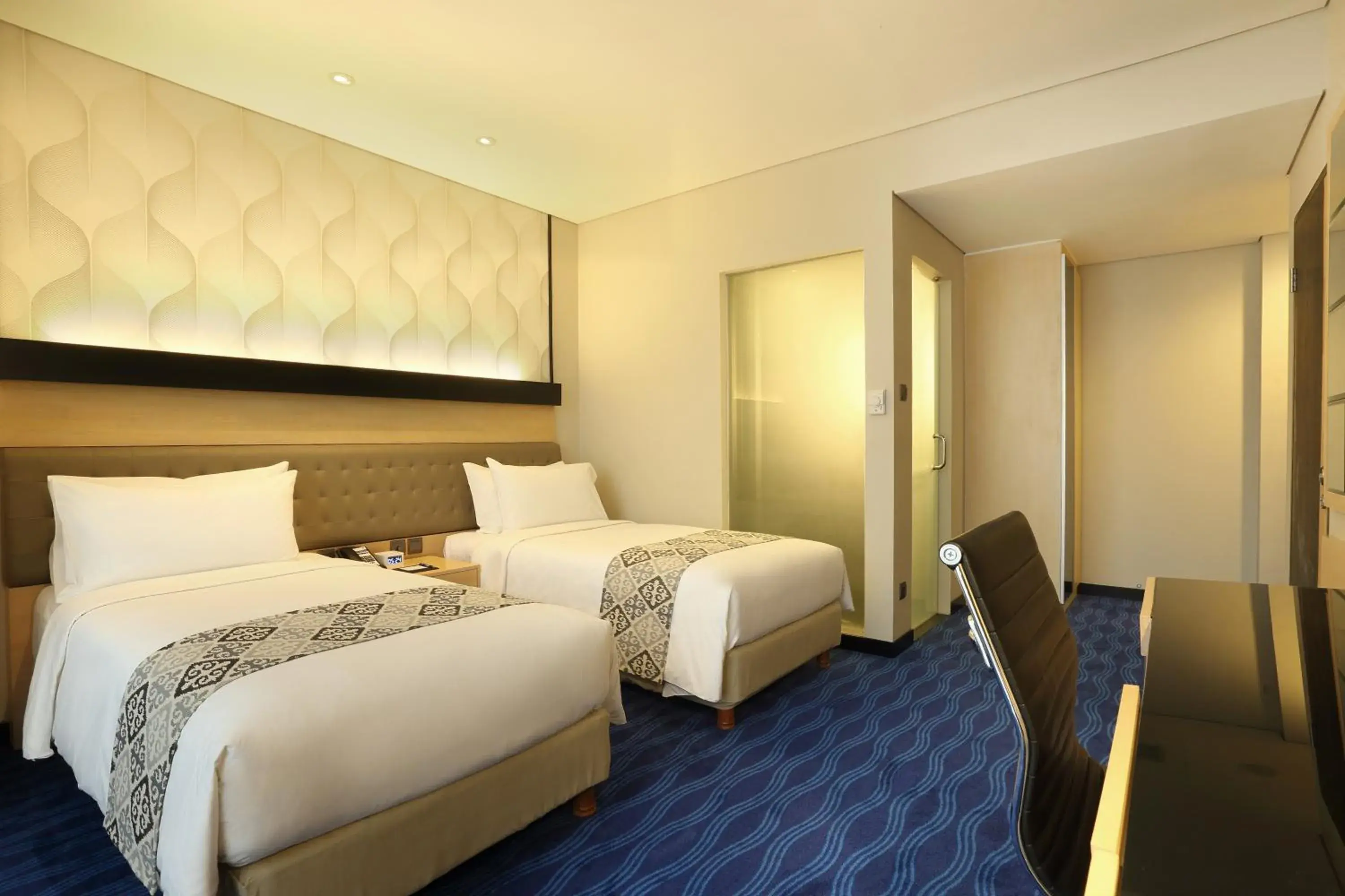 Bed in AI Hotel Jakarta Thamrin