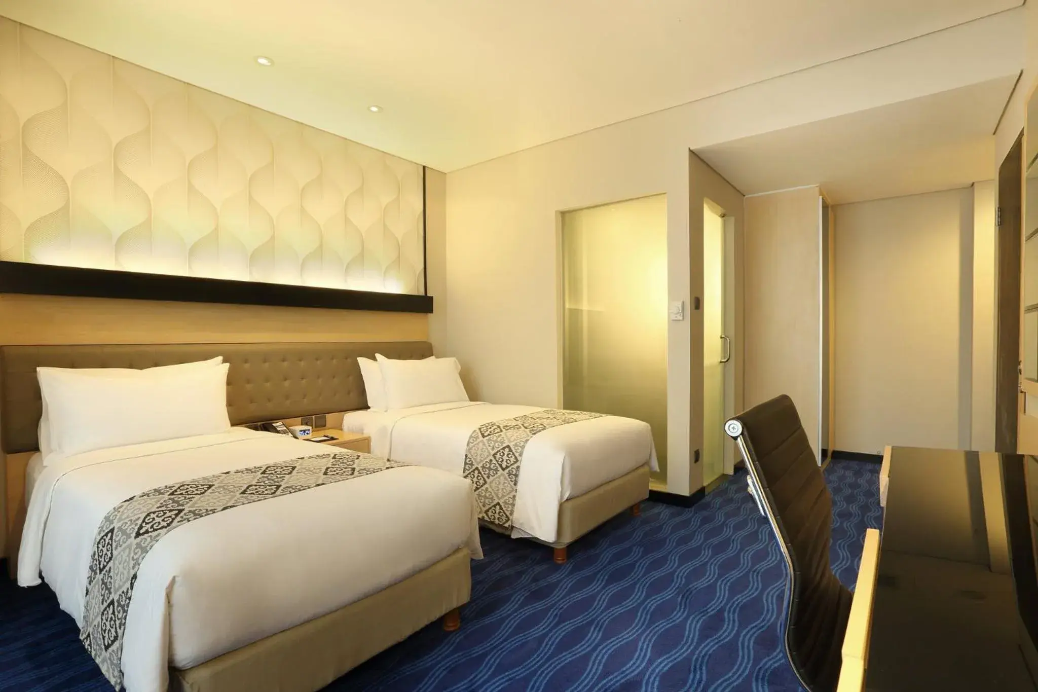 Photo of the whole room, Bed in AI Hotel Jakarta Thamrin