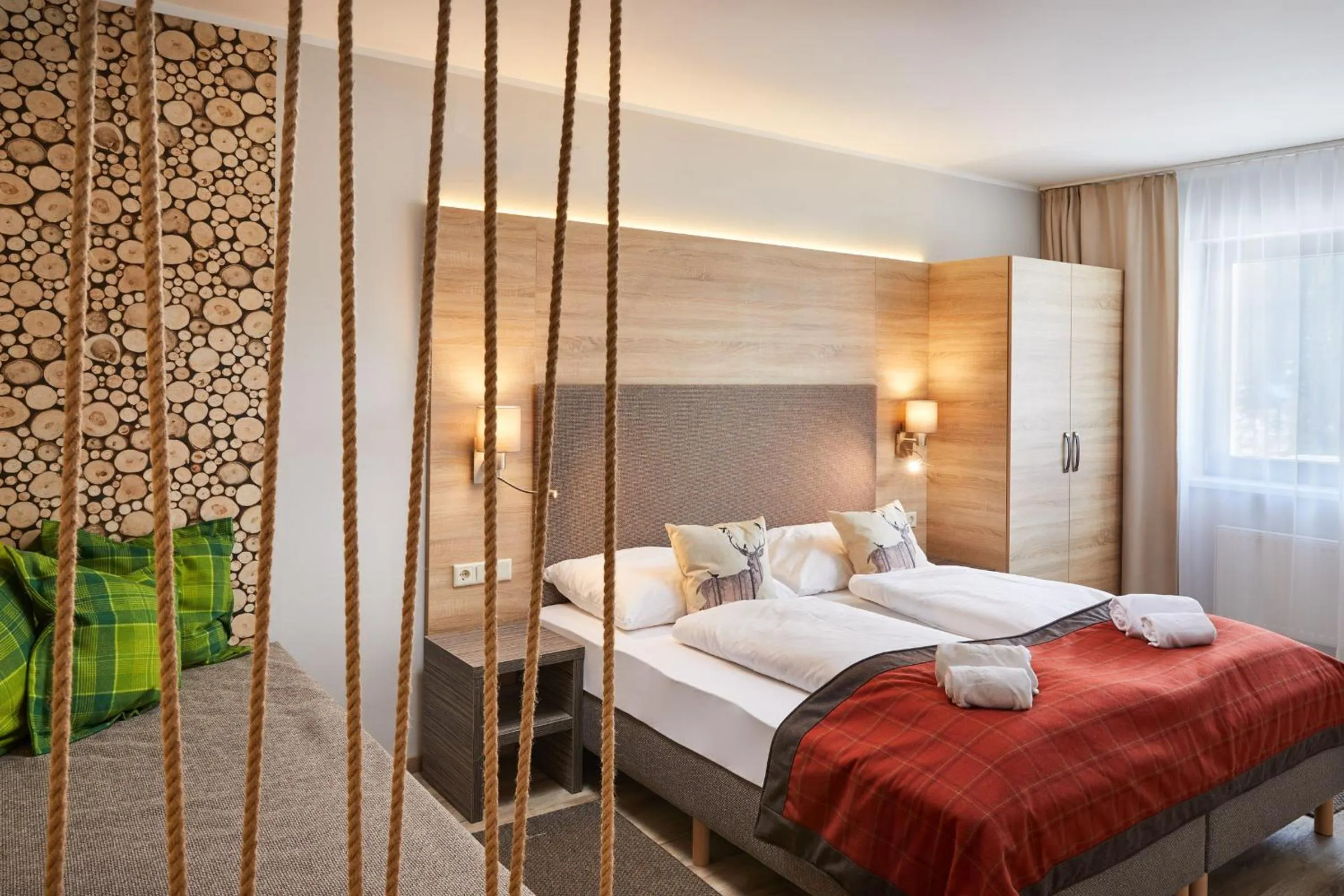 Bed in Das Alpenhaus Katschberg 1640 inkl Lungau Card