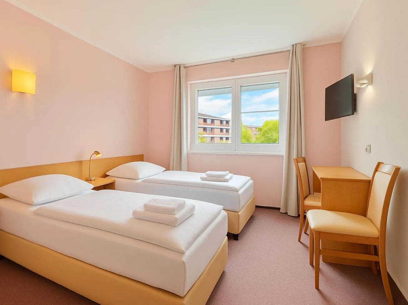 Bed in AR Boutique Hotel Heusenstamm