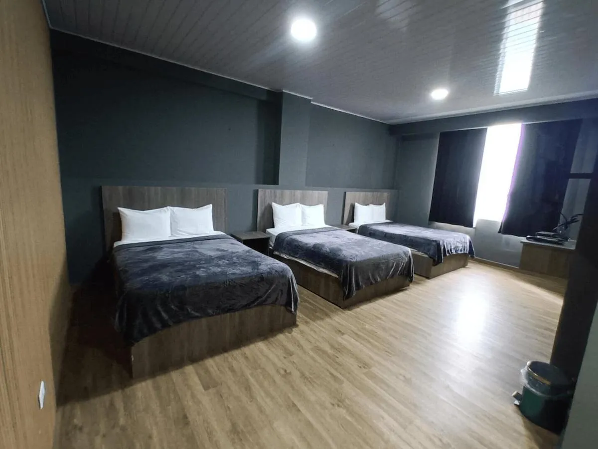 Bed in New Washington Hotel