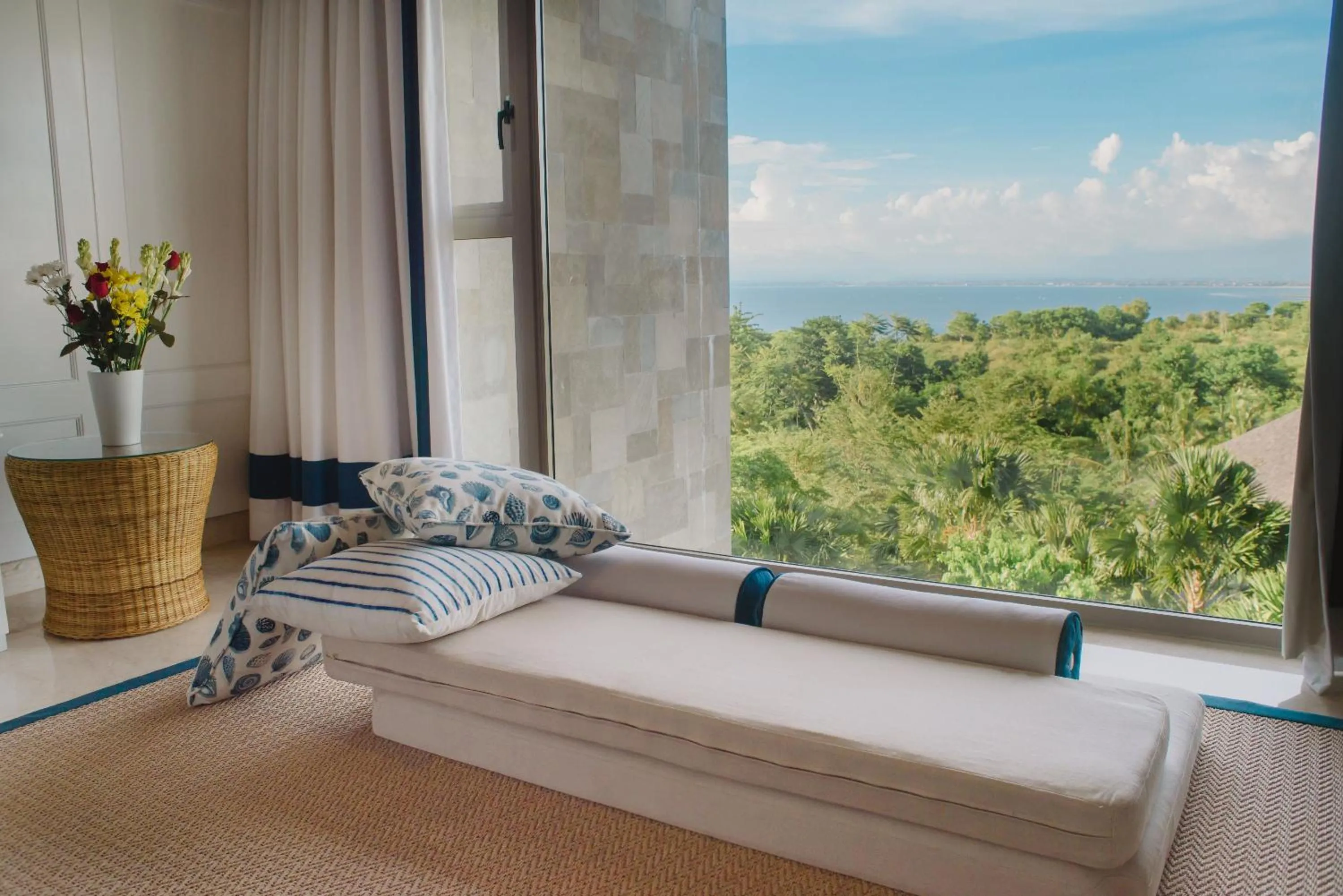 Seating area, Bed in Luxury Apartment at AYANA Residences