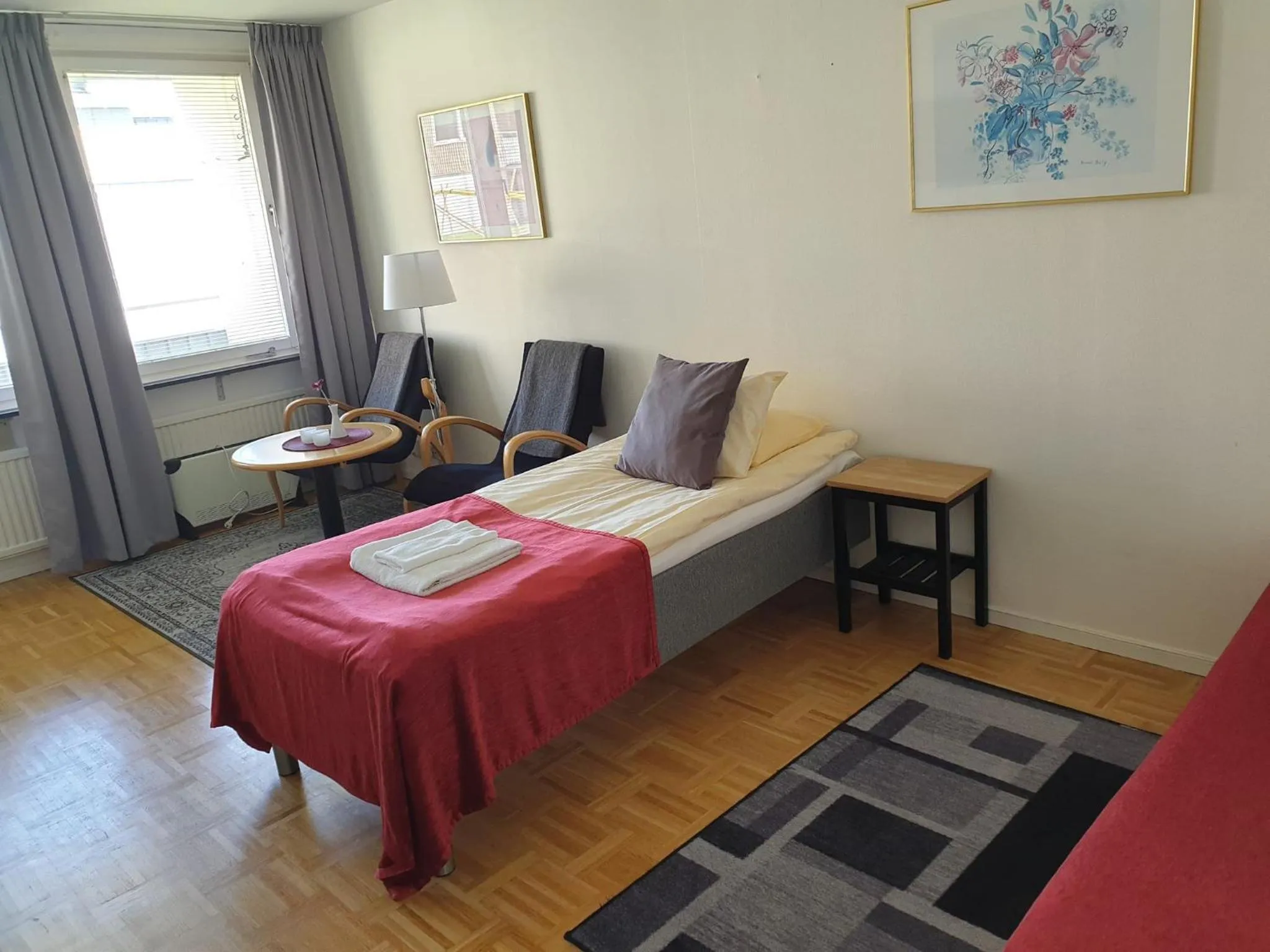 Bed in RS Lägenhetshotell Skövde