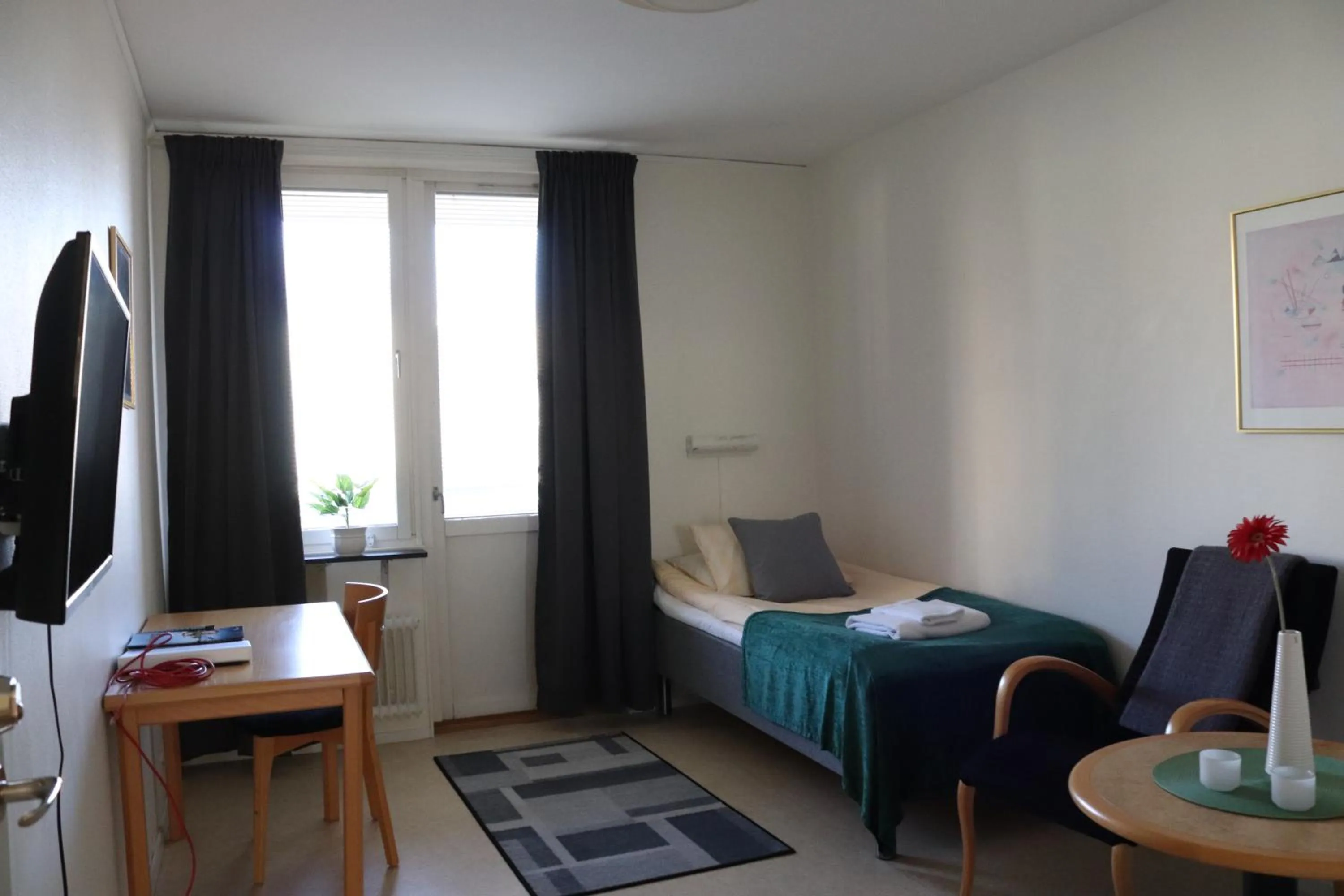 Bed in RS Lägenhetshotell Skövde