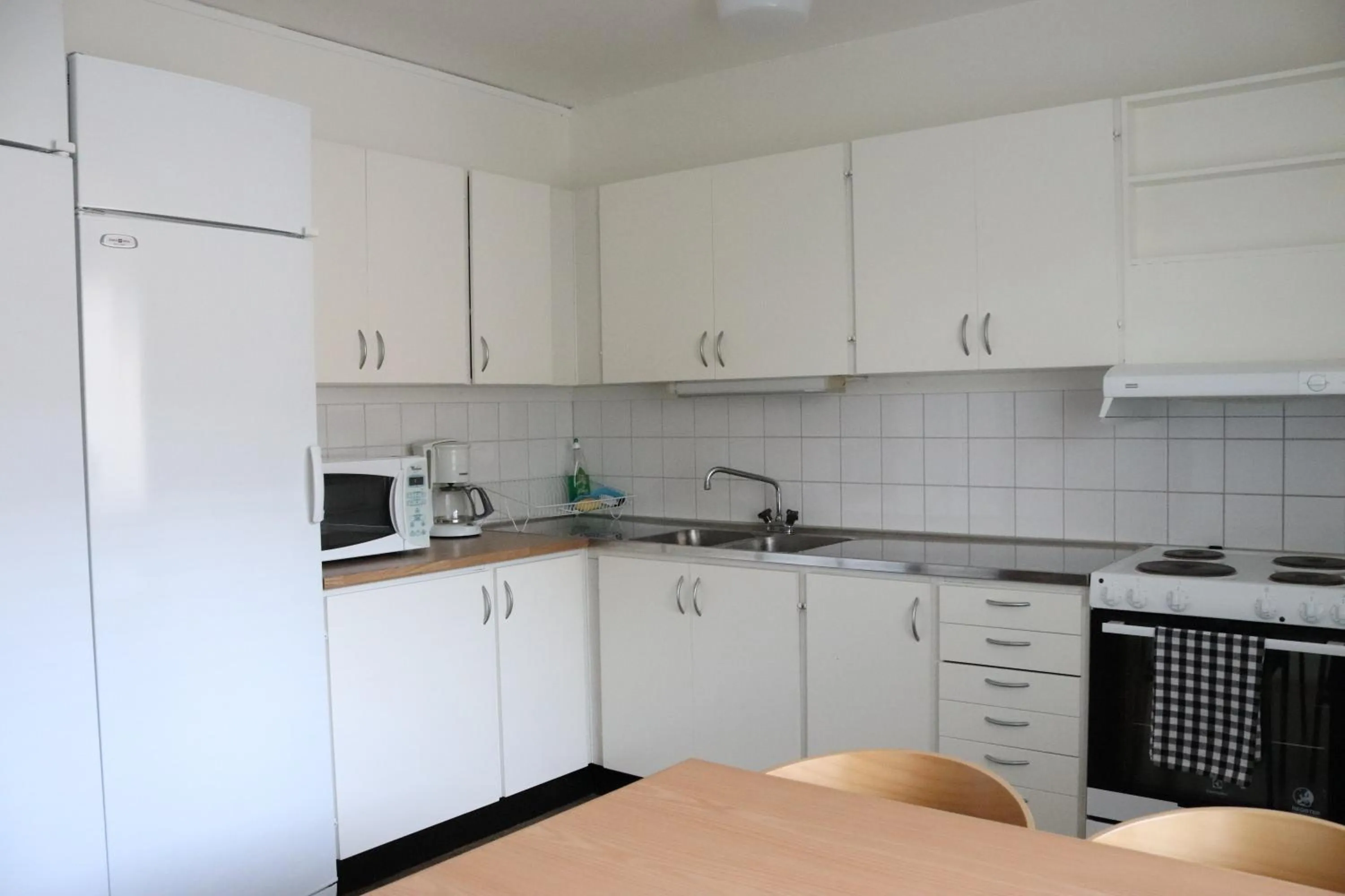 Kitchen or kitchenette in RS Lägenhetshotell Skövde