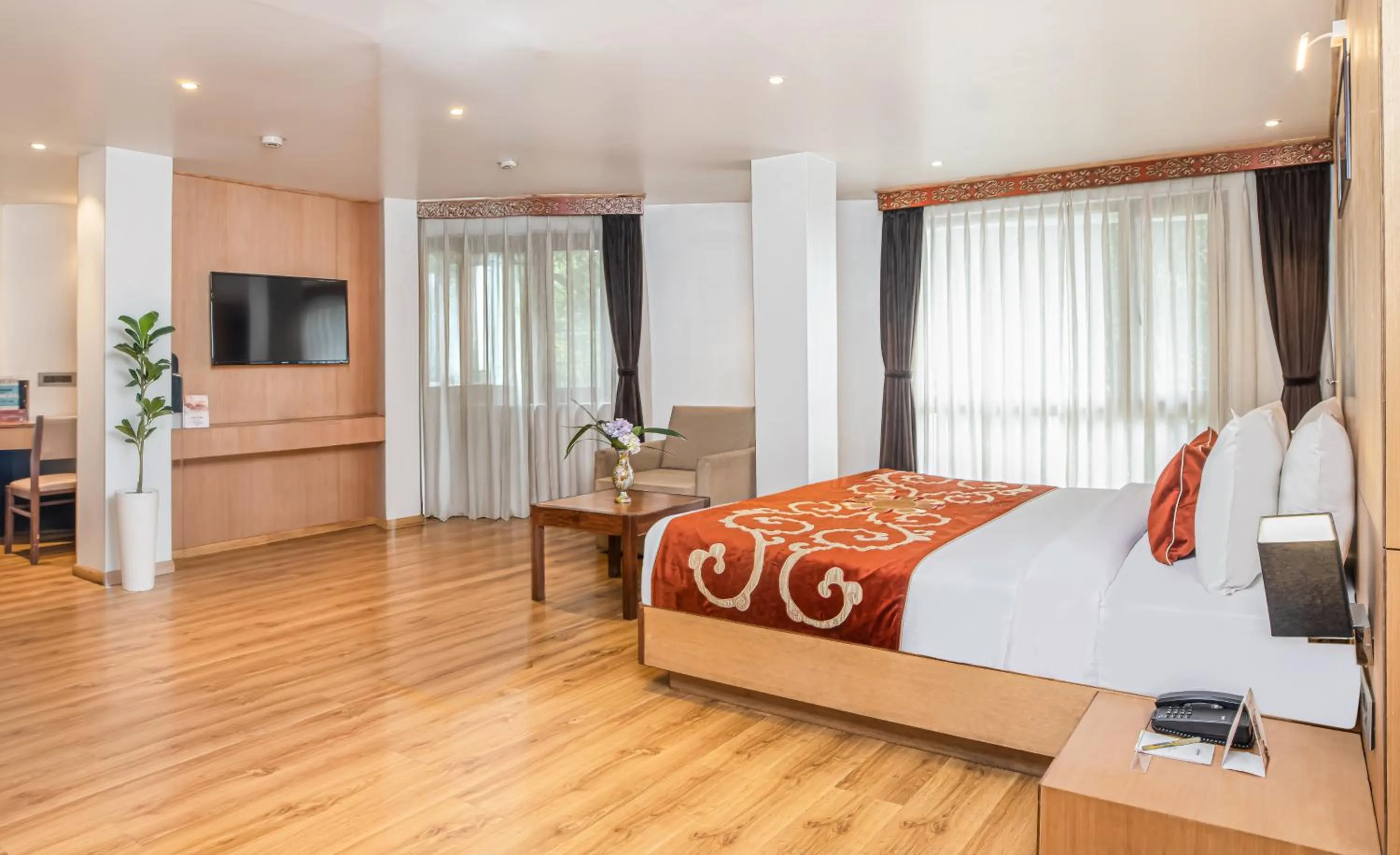 Bed in Summit Swiss Heritage Resort & Spa