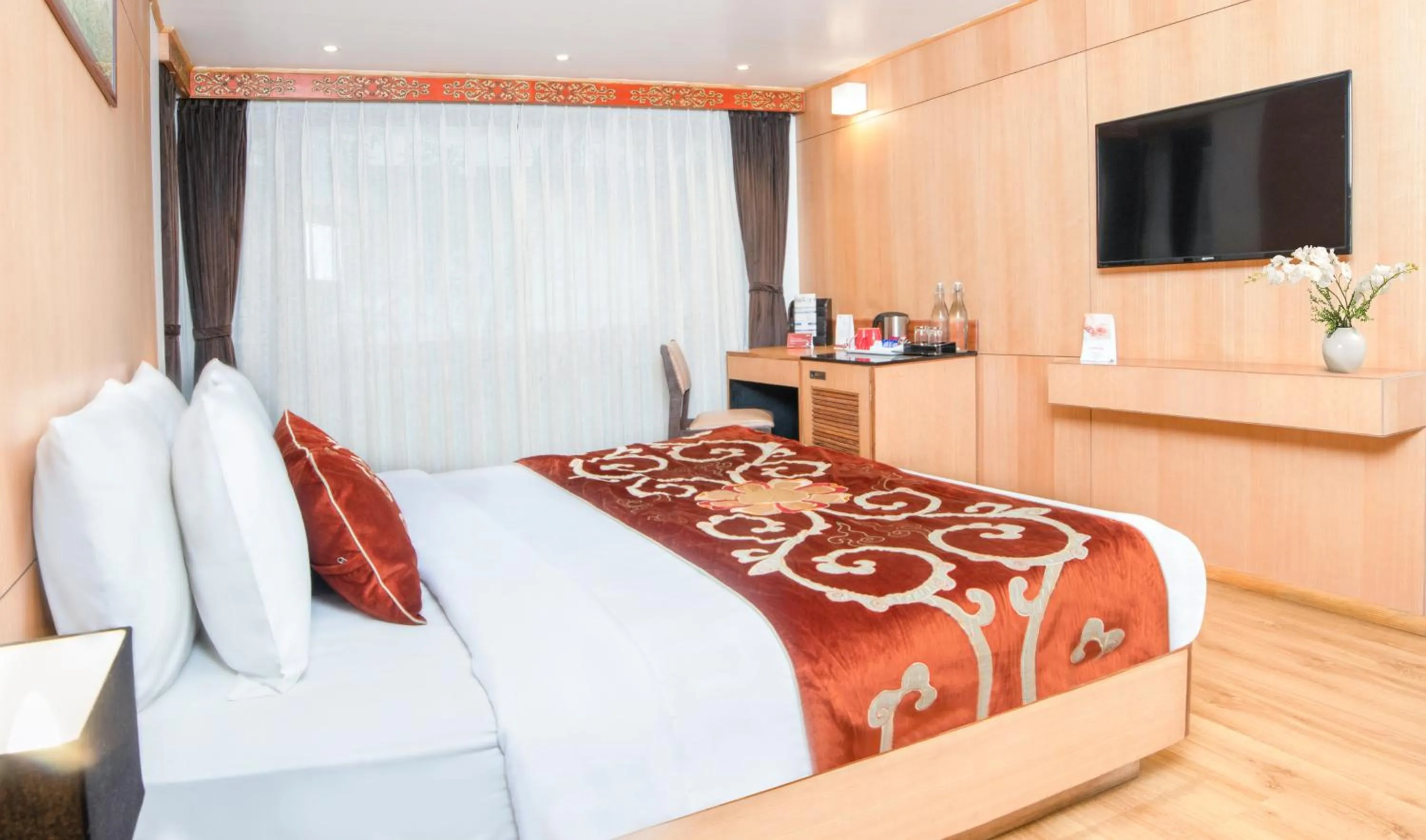 Bed in Summit Swiss Heritage Resort & Spa