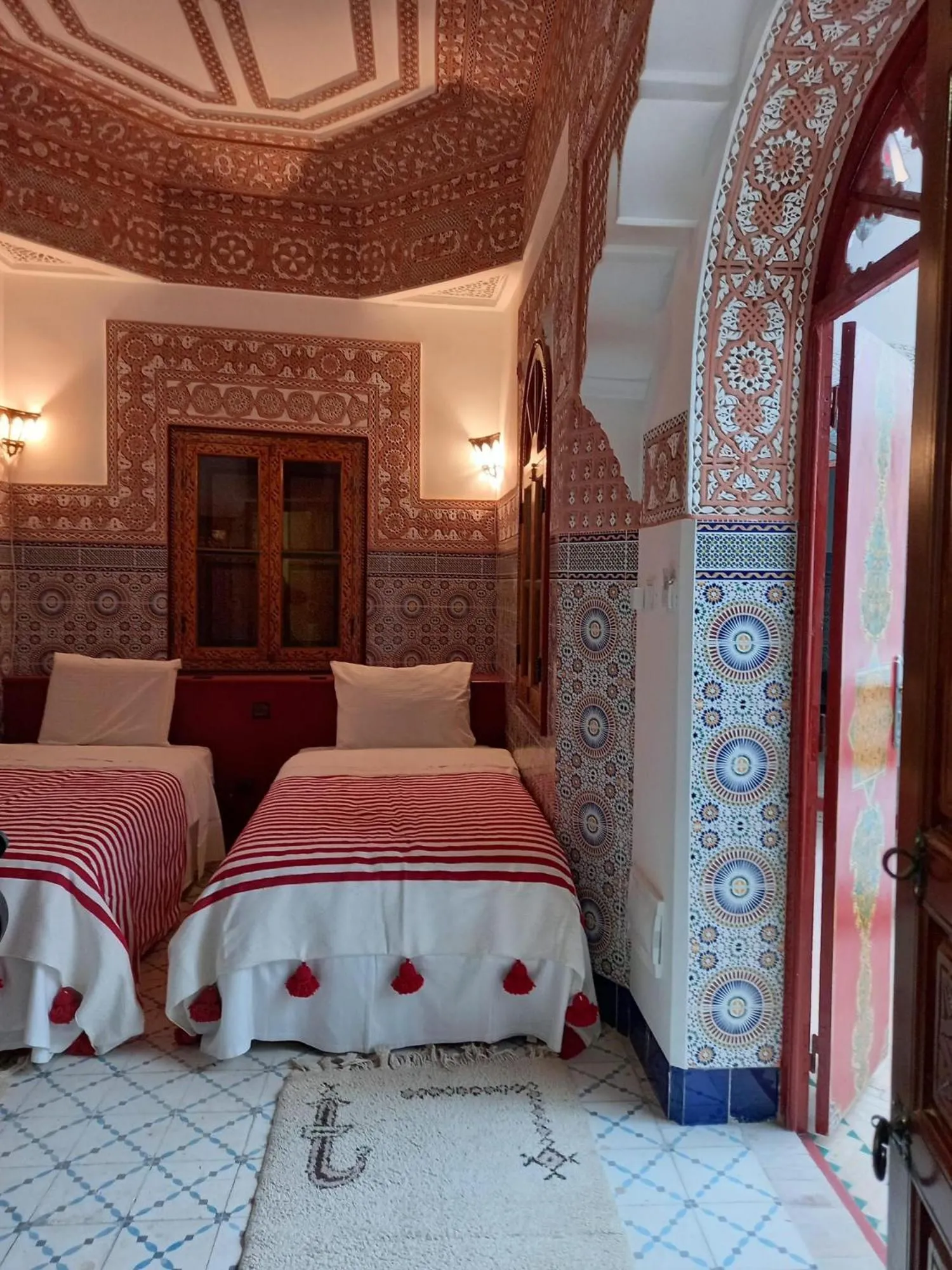 Bed in Riad Alma Mouassine