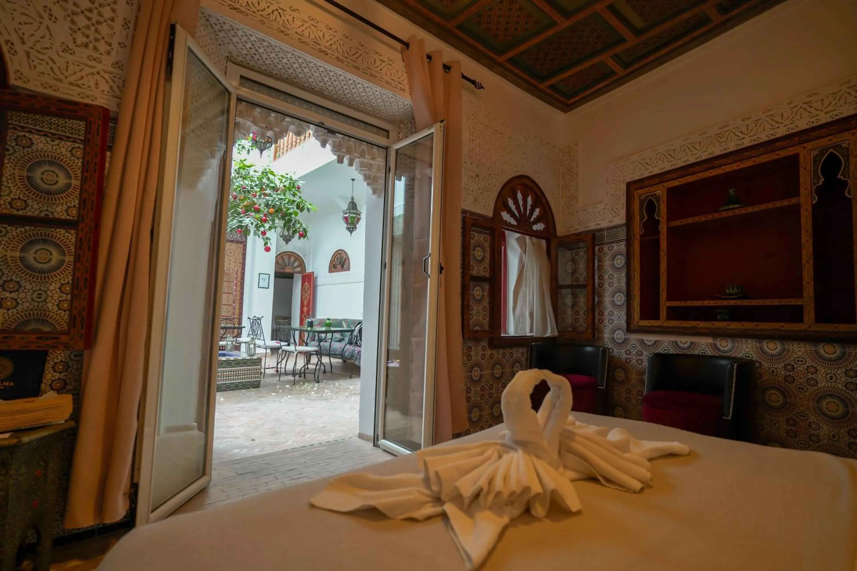 Bed in Riad Alma Mouassine