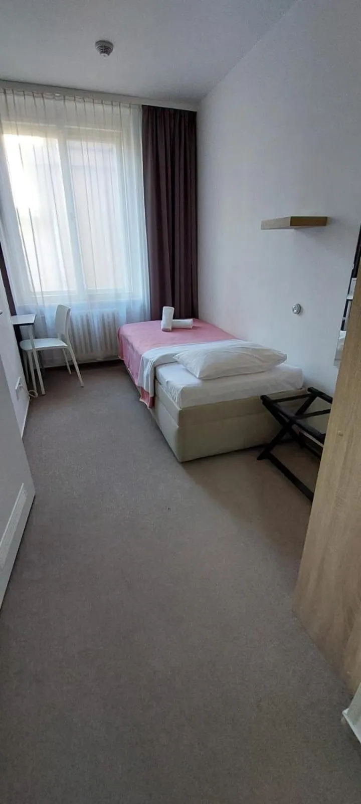 Bed in Hotel Marianeum