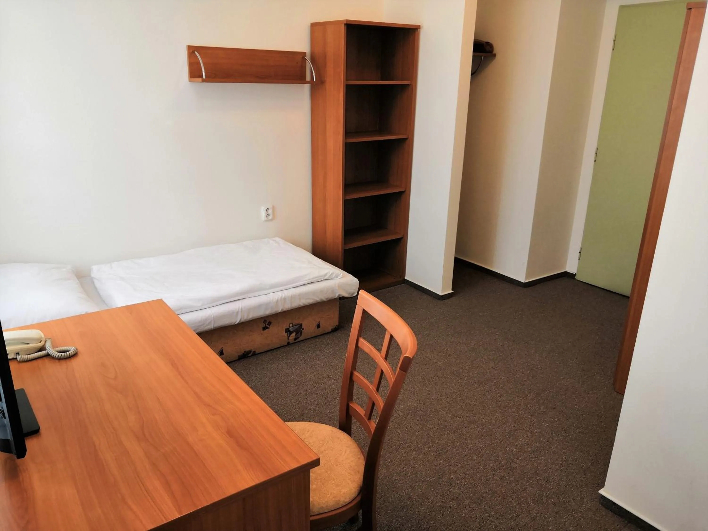 Bed in Hotel Marianeum